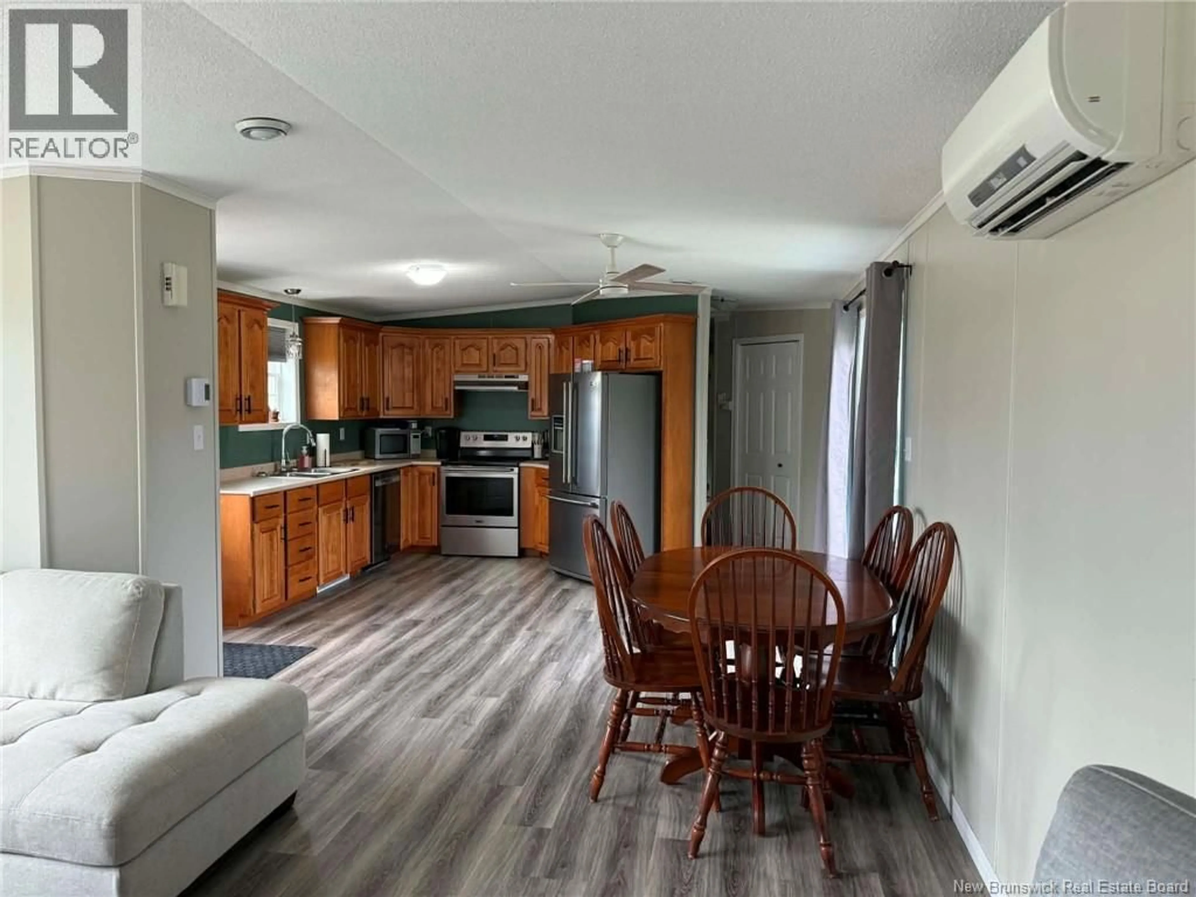 Open concept kitchen, wood/laminate floor for 4 AMOS STREET, Miramichi New Brunswick E1V7V5