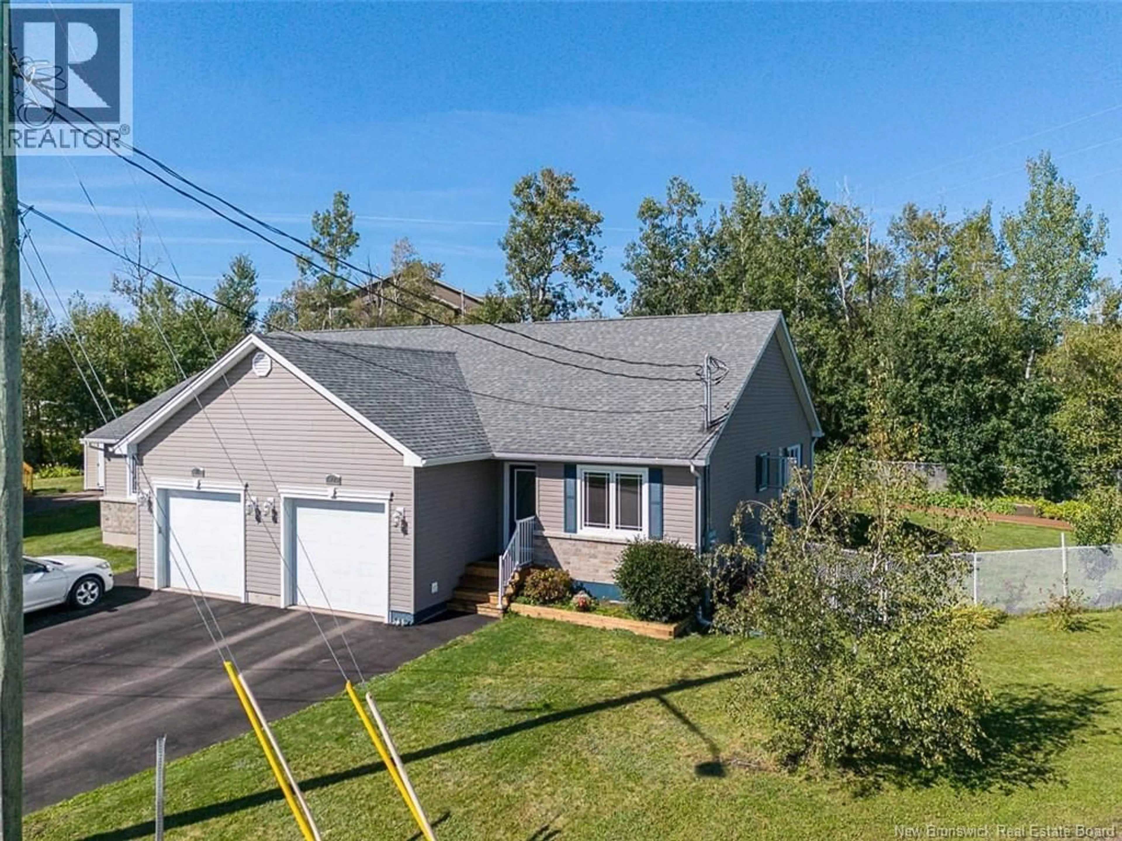 A pic from outside/outdoor area/front of a property/back of a property/a pic from drone, street for 77 STILLWATER DRIVE, Moncton New Brunswick E1E0E3