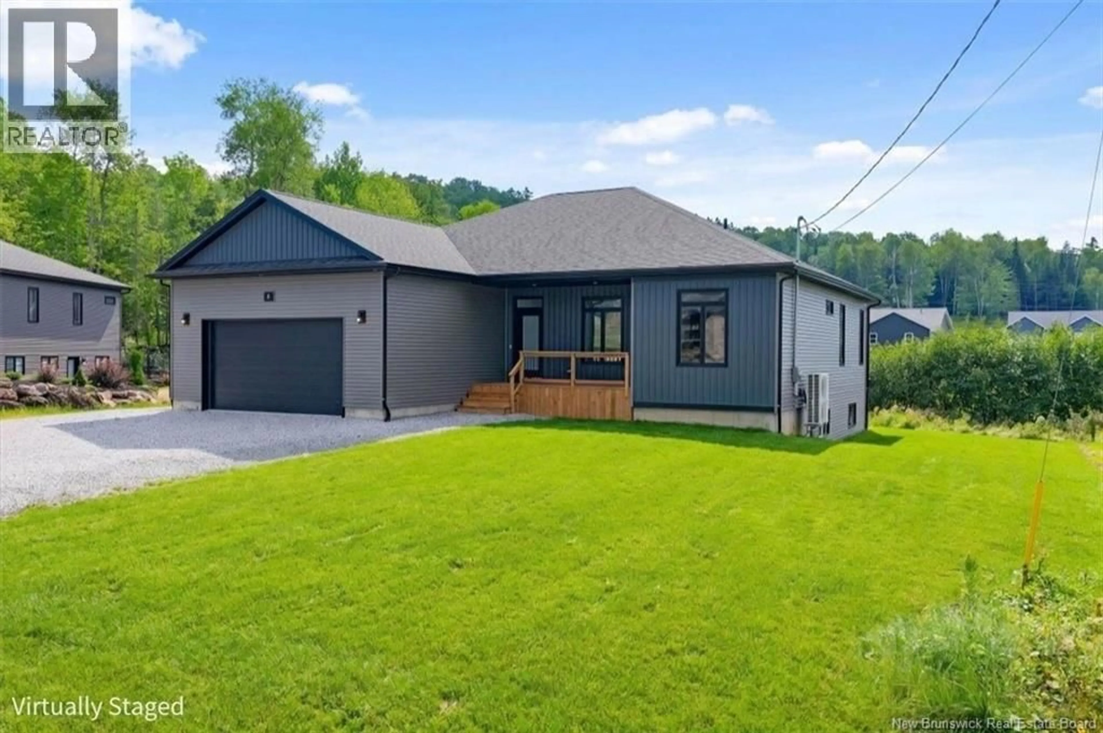 A pic from outside/outdoor area/front of a property/back of a property/a pic from drone, water/lake/river/ocean view for 8 GALMORGAN DRIVE, Quispamsis New Brunswick E2E0X1