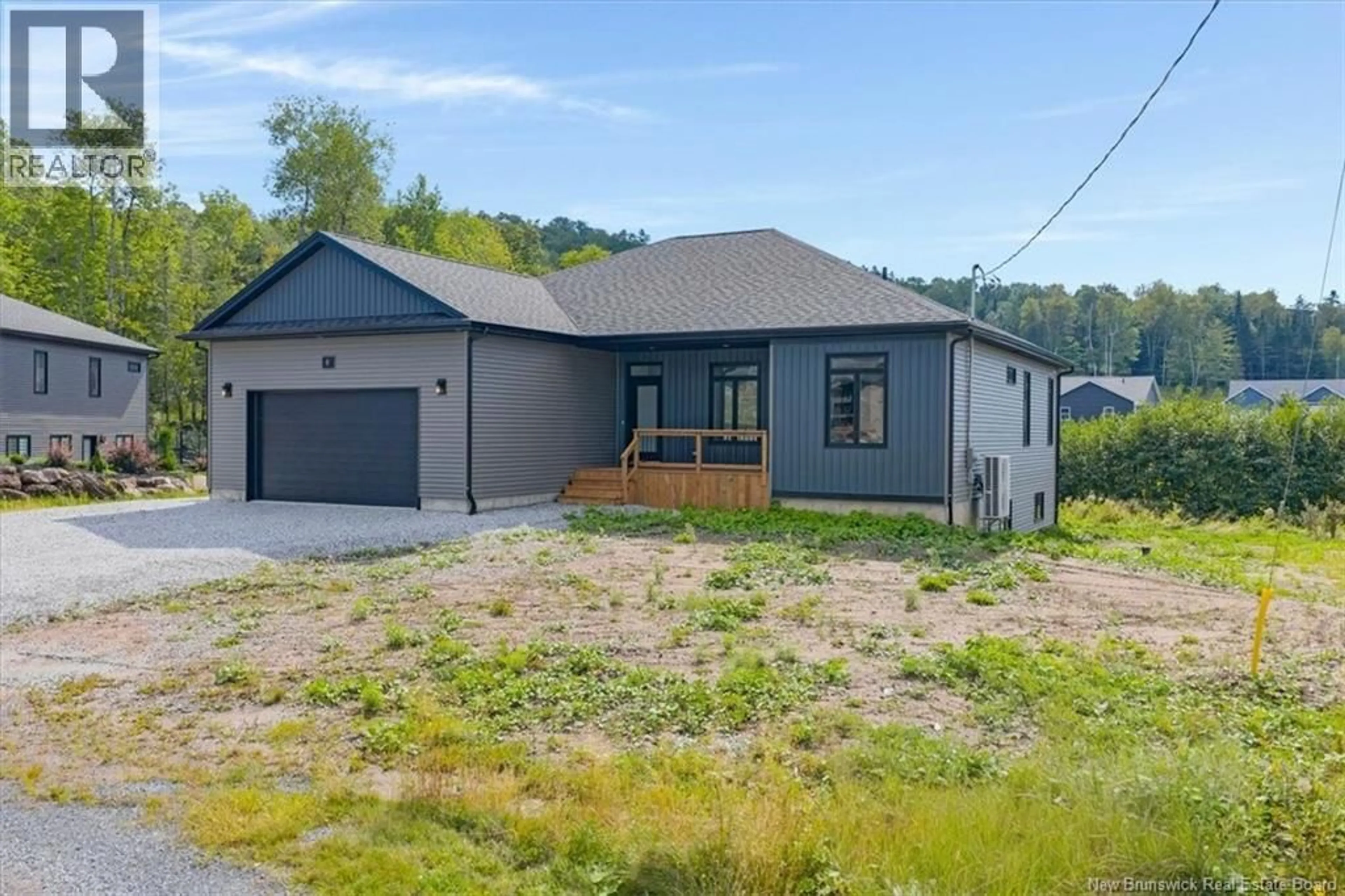A pic from outside/outdoor area/front of a property/back of a property/a pic from drone, street for 8 GALMORGAN DRIVE, Quispamsis New Brunswick E2E0X1