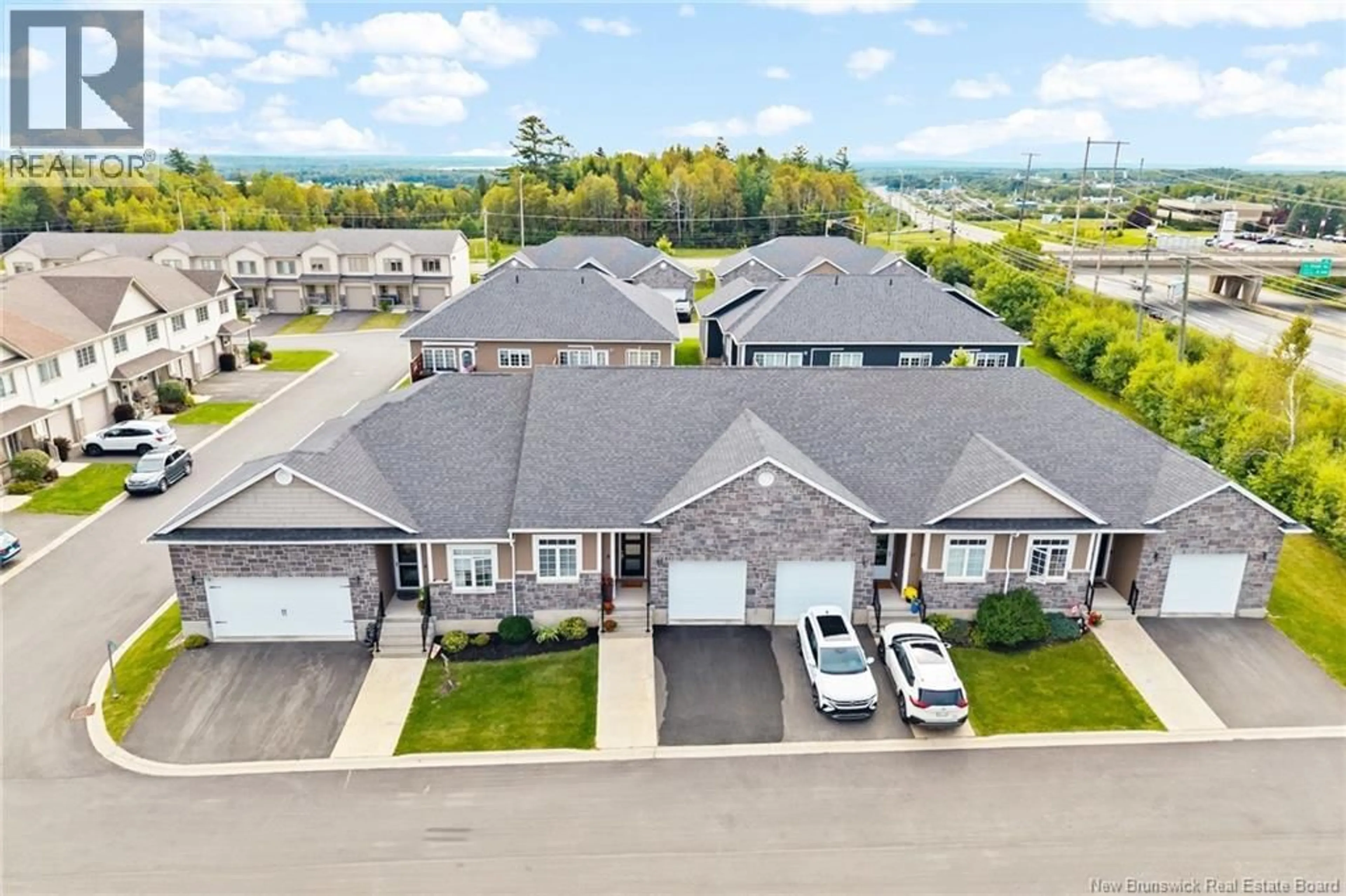 A pic from outside/outdoor area/front of a property/back of a property/a pic from drone, street for 9 PTARMIGAN LANE, Fredericton New Brunswick E3B0T1