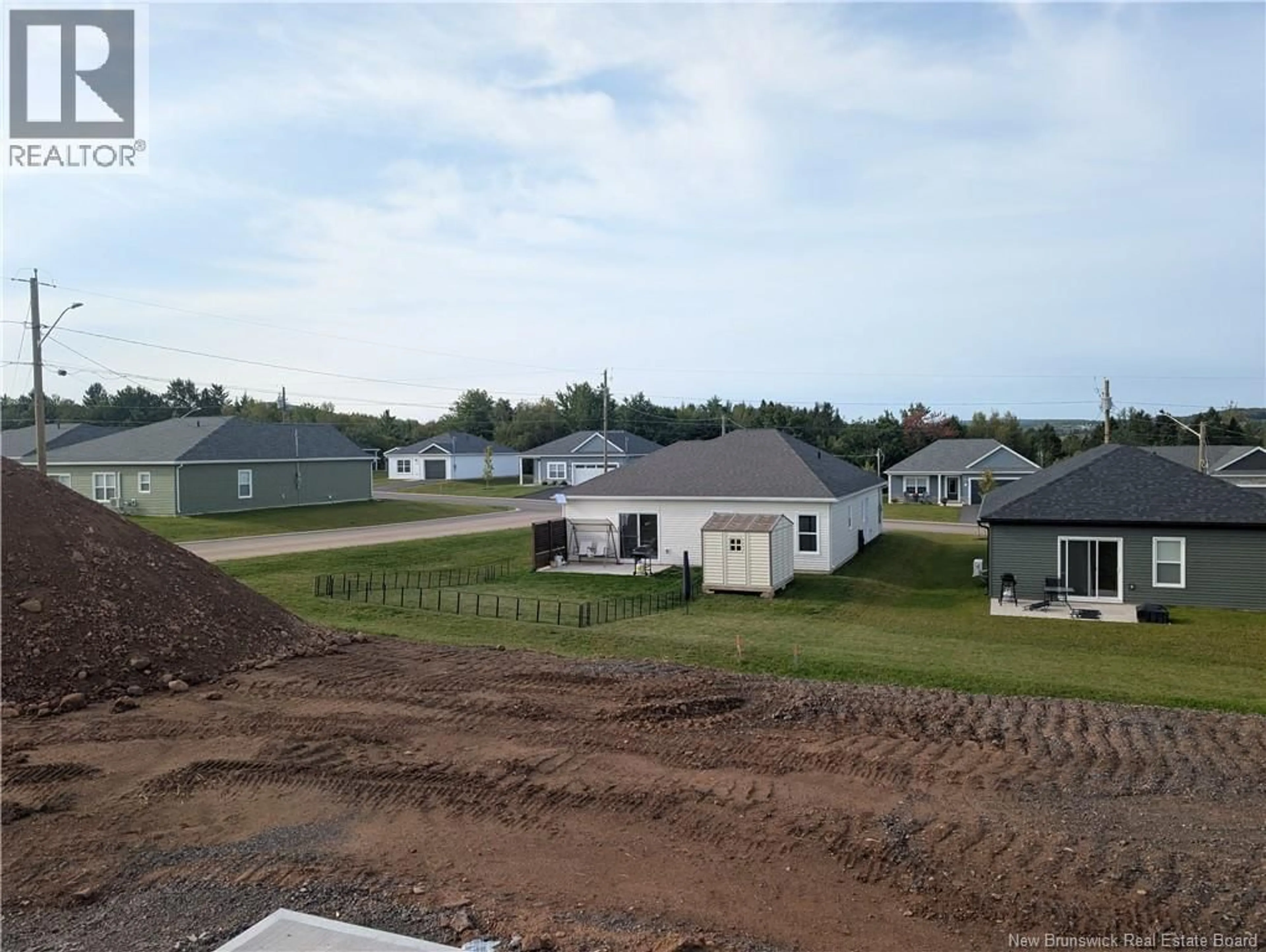 A pic from outside/outdoor area/front of a property/back of a property/a pic from drone, unknown for 45 HUGH CRESCENT, Sussex Corner New Brunswick E4E0M6