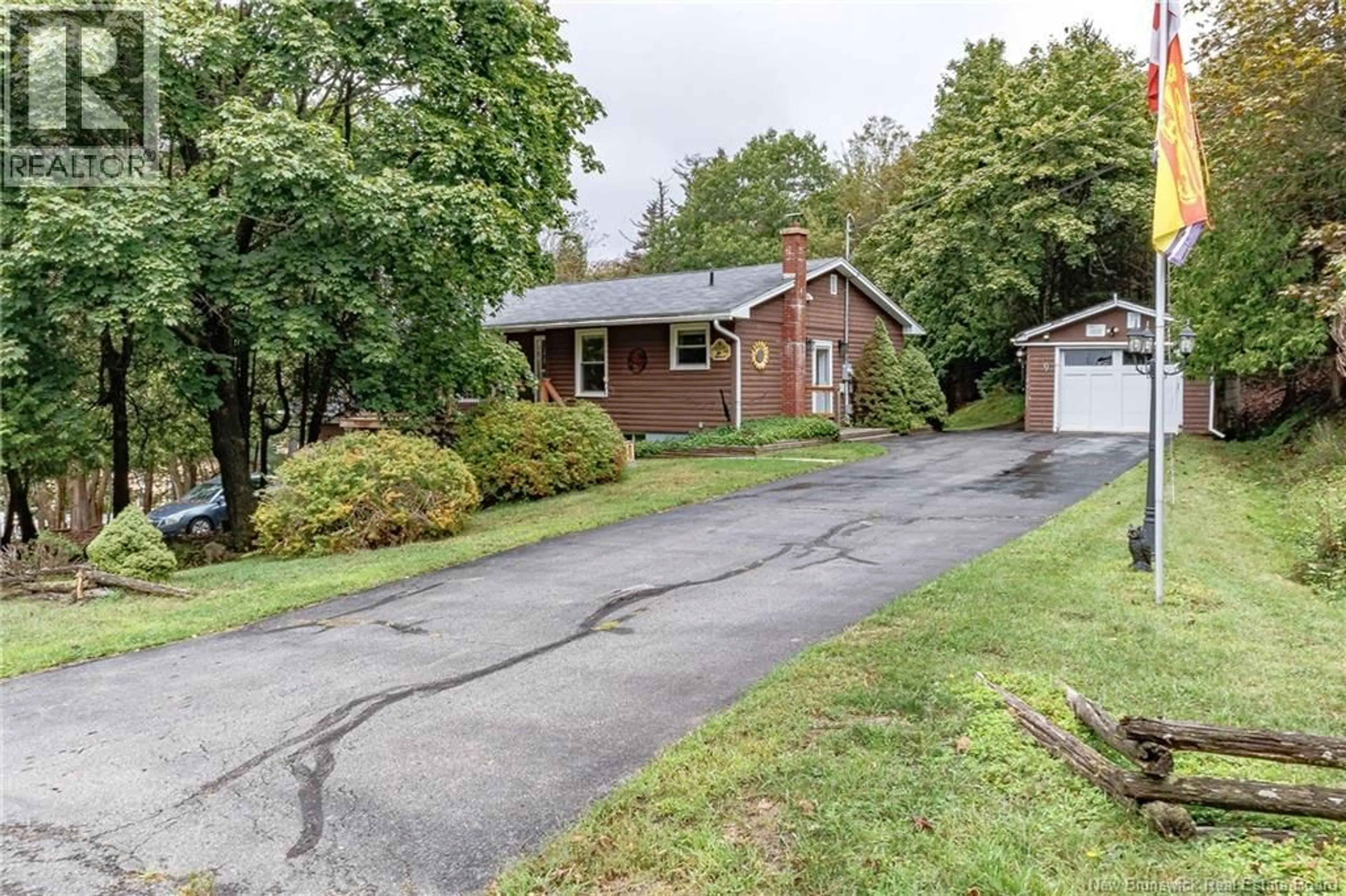 A pic from outside/outdoor area/front of a property/back of a property/a pic from drone, street for 9 MILNE STREET, Rothesay New Brunswick E2E1Y8
