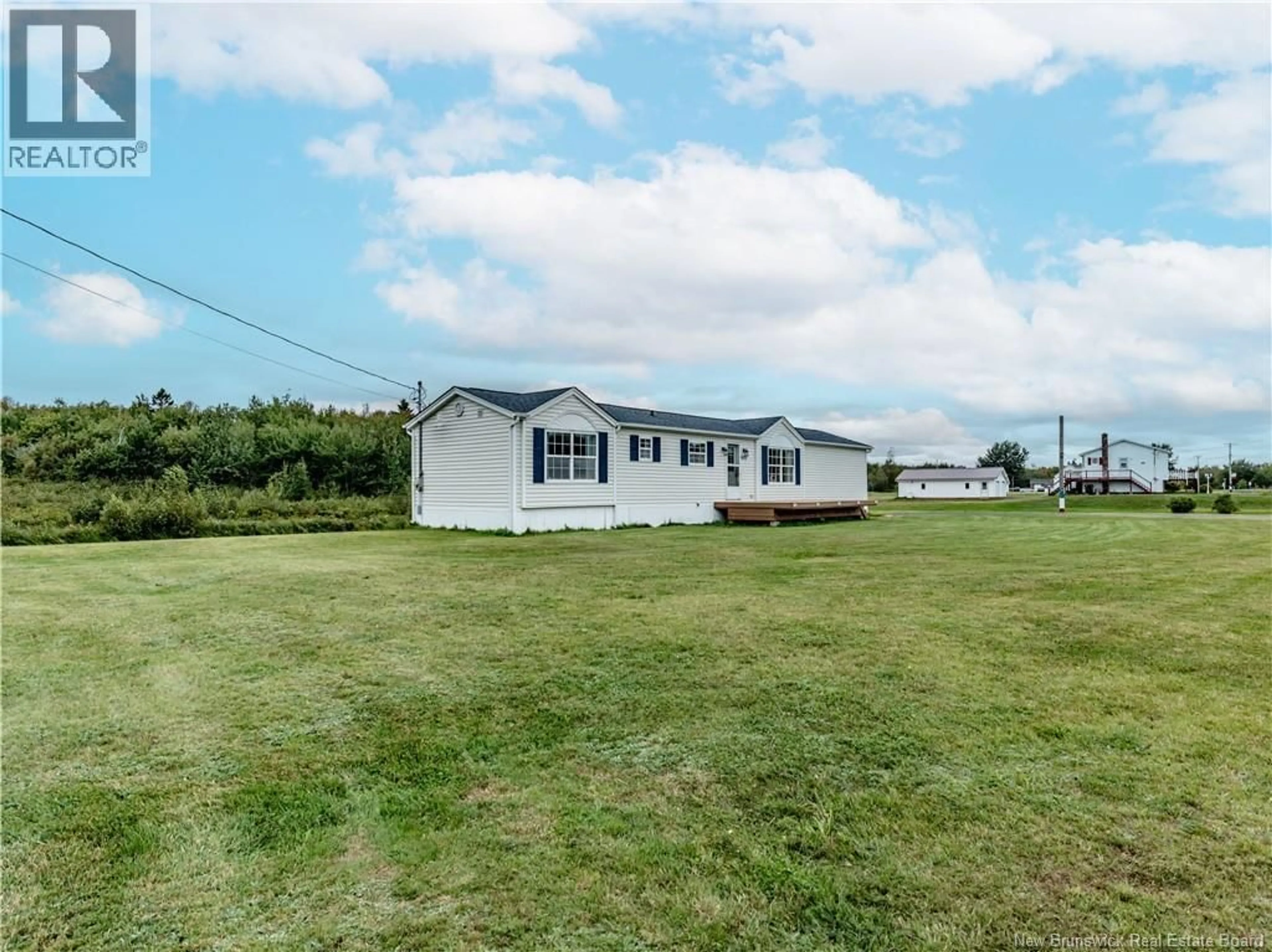 A pic from outside/outdoor area/front of a property/back of a property/a pic from drone, water/lake/river/ocean view for 3509 ROUTE 117, Pointe-Sapin New Brunswick E9A1T1