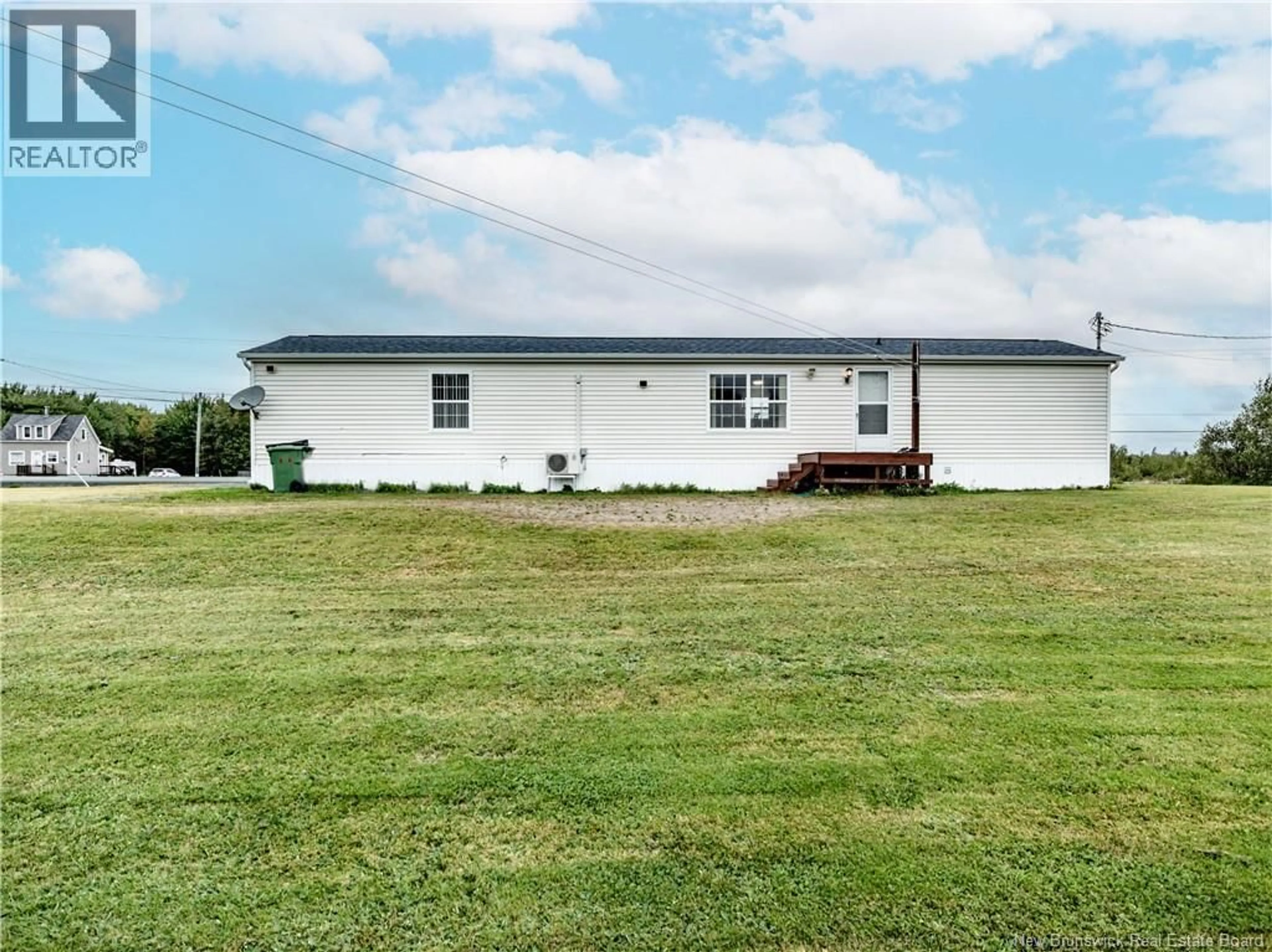 A pic from outside/outdoor area/front of a property/back of a property/a pic from drone, unknown for 3509 ROUTE 117, Pointe-Sapin New Brunswick E9A1T1