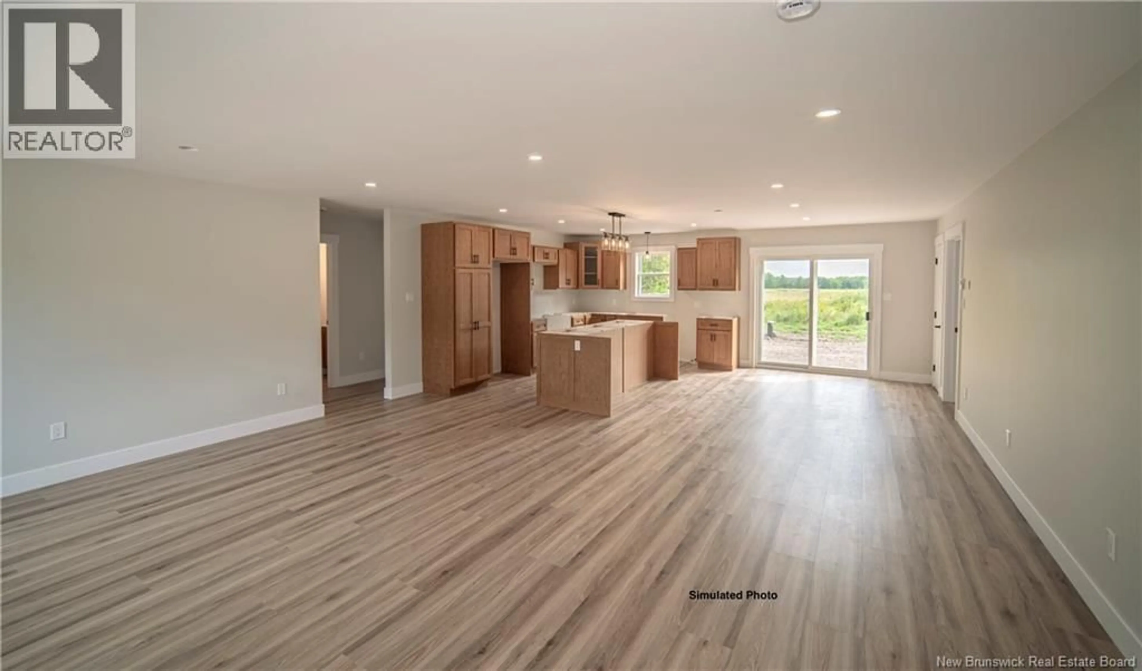 Open concept kitchen, wood/laminate floor for 49 DEWITT ROAD, Rusagonis New Brunswick E3B8X5