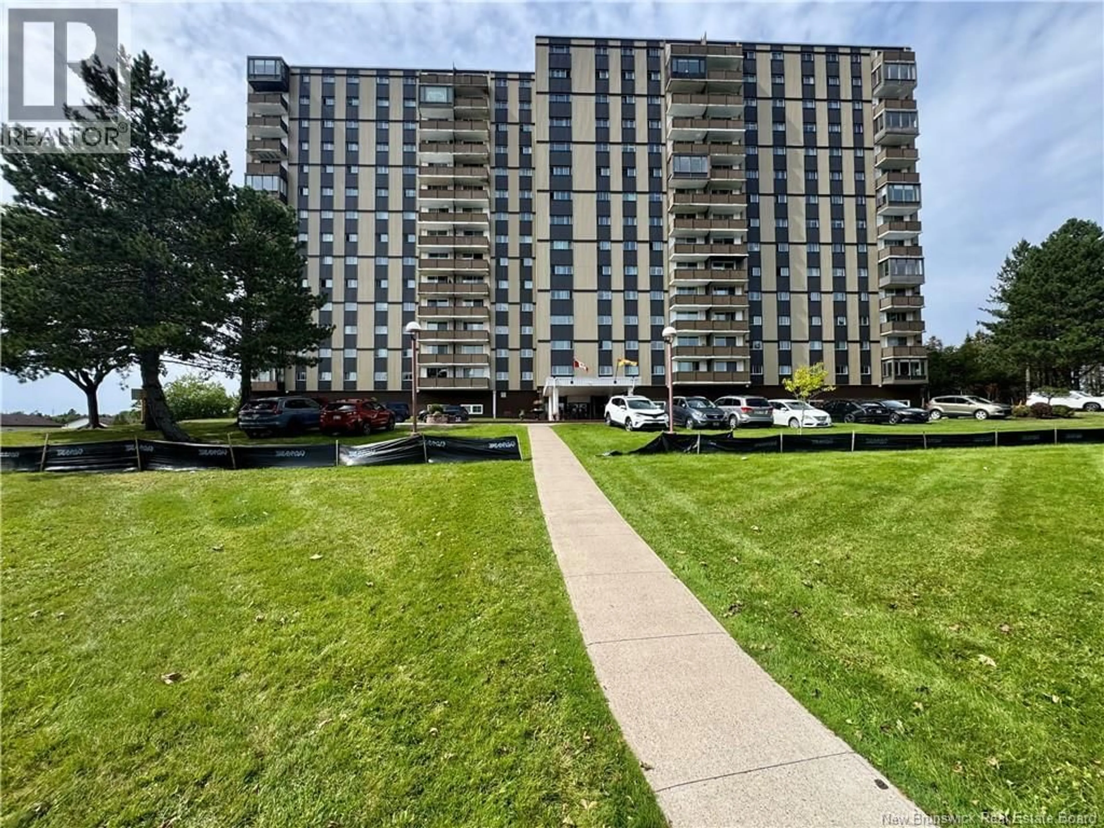 A pic from outside/outdoor area/front of a property/back of a property/a pic from drone, street for 703 - 310 WOODWARD AVENUE, Saint John New Brunswick E2K2L1