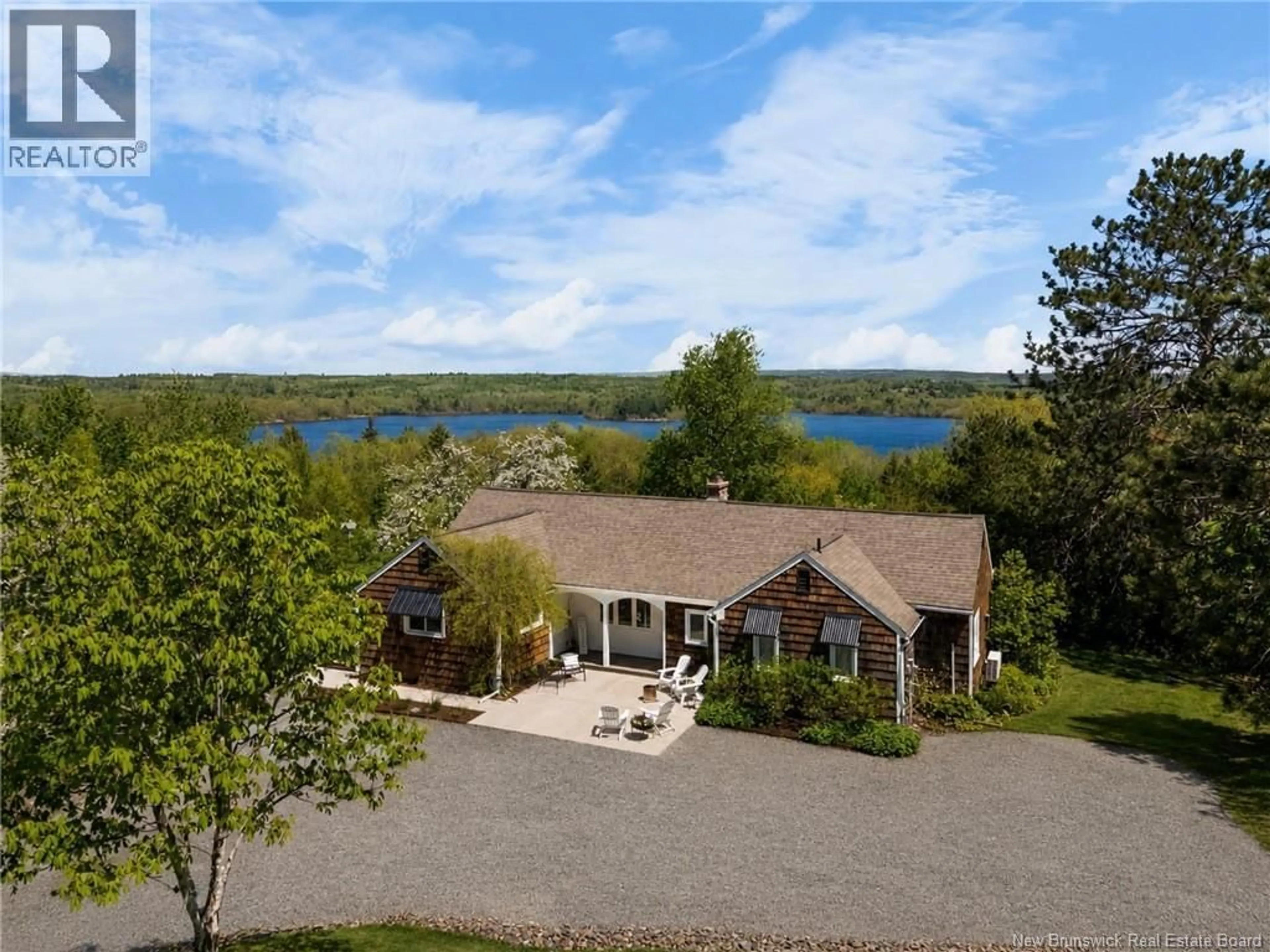 A pic from outside/outdoor area/front of a property/back of a property/a pic from drone, water/lake/river/ocean view for 4485 ROUTE 102, Queenstown New Brunswick E5M1Z5