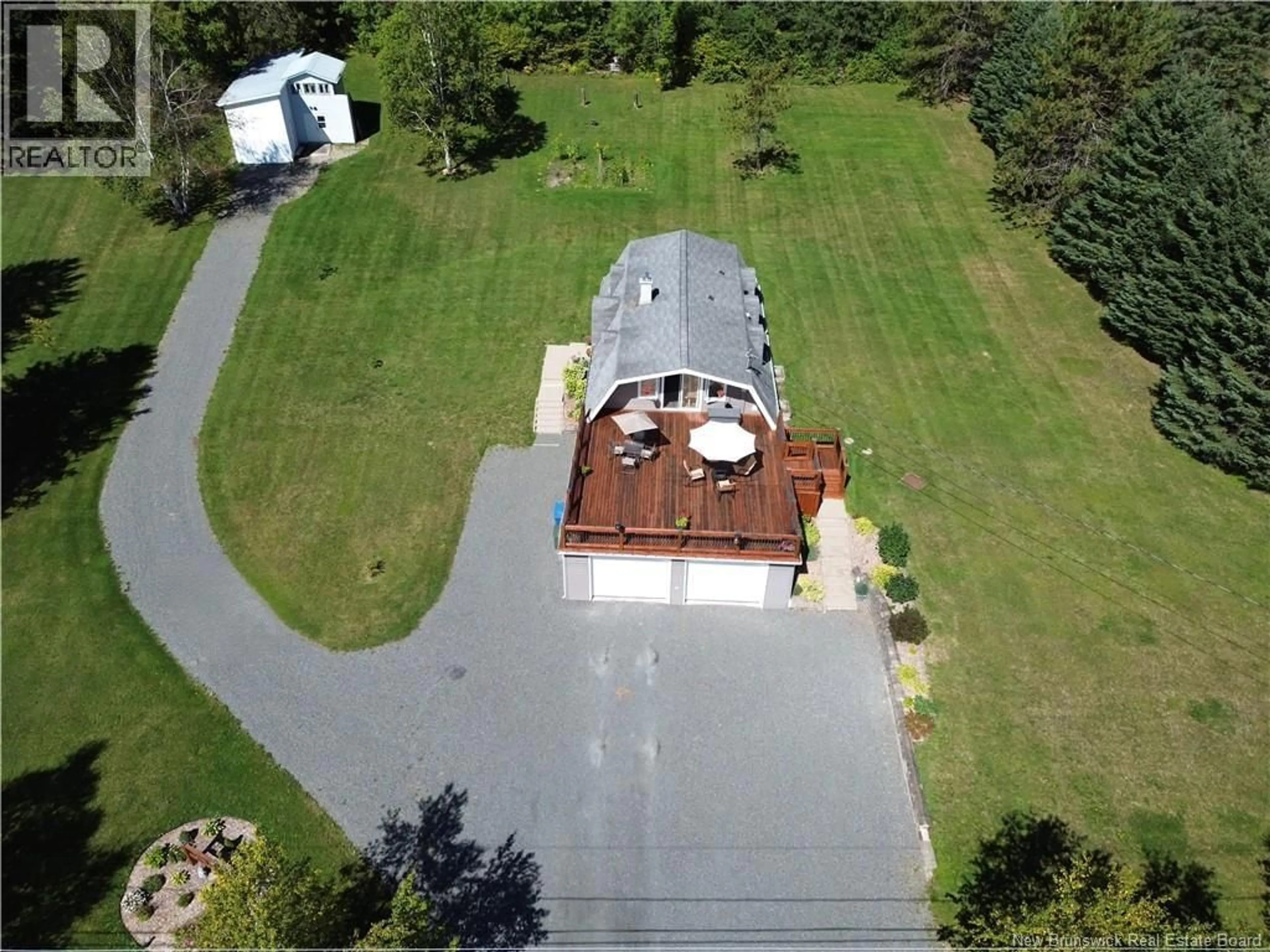 A pic from outside/outdoor area/front of a property/back of a property/a pic from drone, building for 12 CARON ROAD, DSL de Drummond/DSL of Drummond New Brunswick E3Y1M7