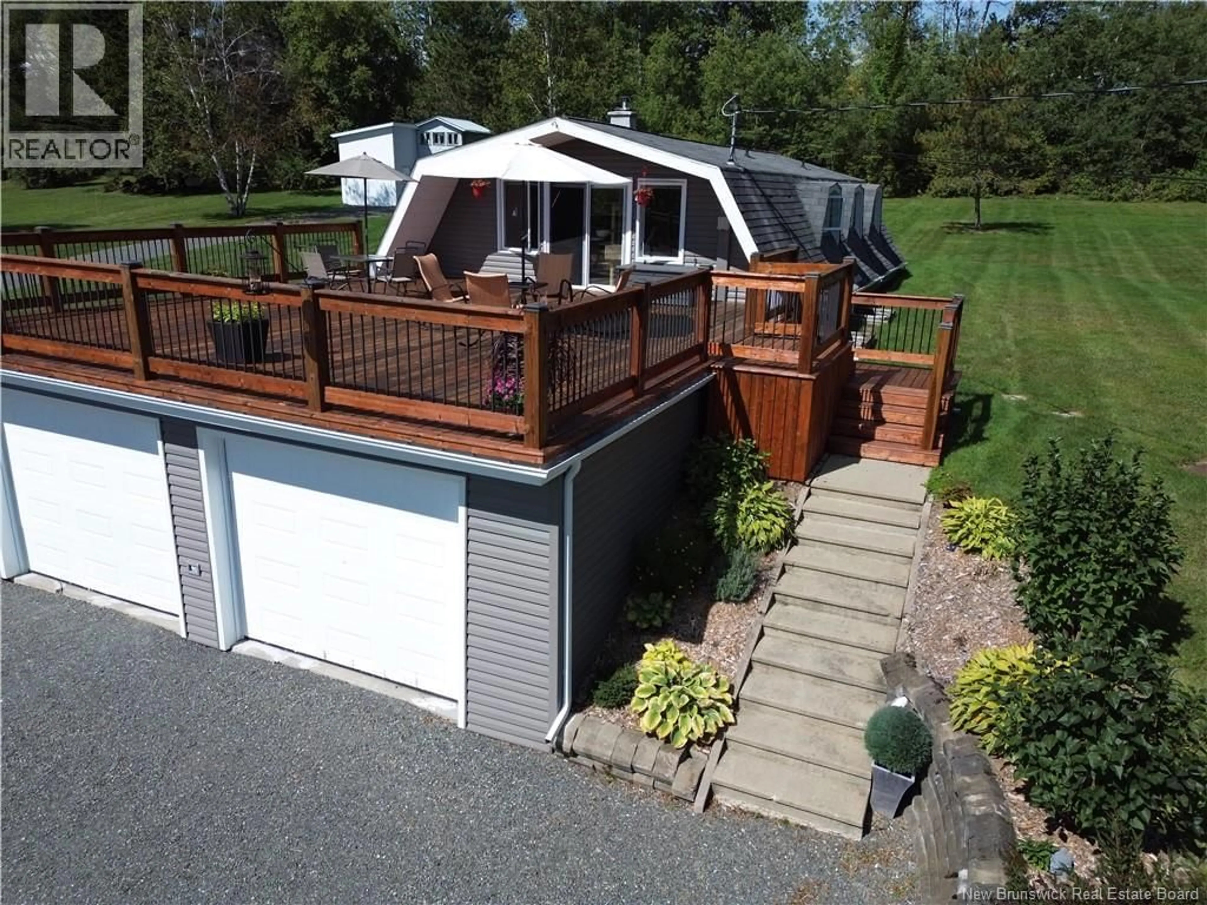 A pic from outside/outdoor area/front of a property/back of a property/a pic from drone, water/lake/river/ocean view for 12 CARON ROAD, DSL de Drummond/DSL of Drummond New Brunswick E3Y1M7