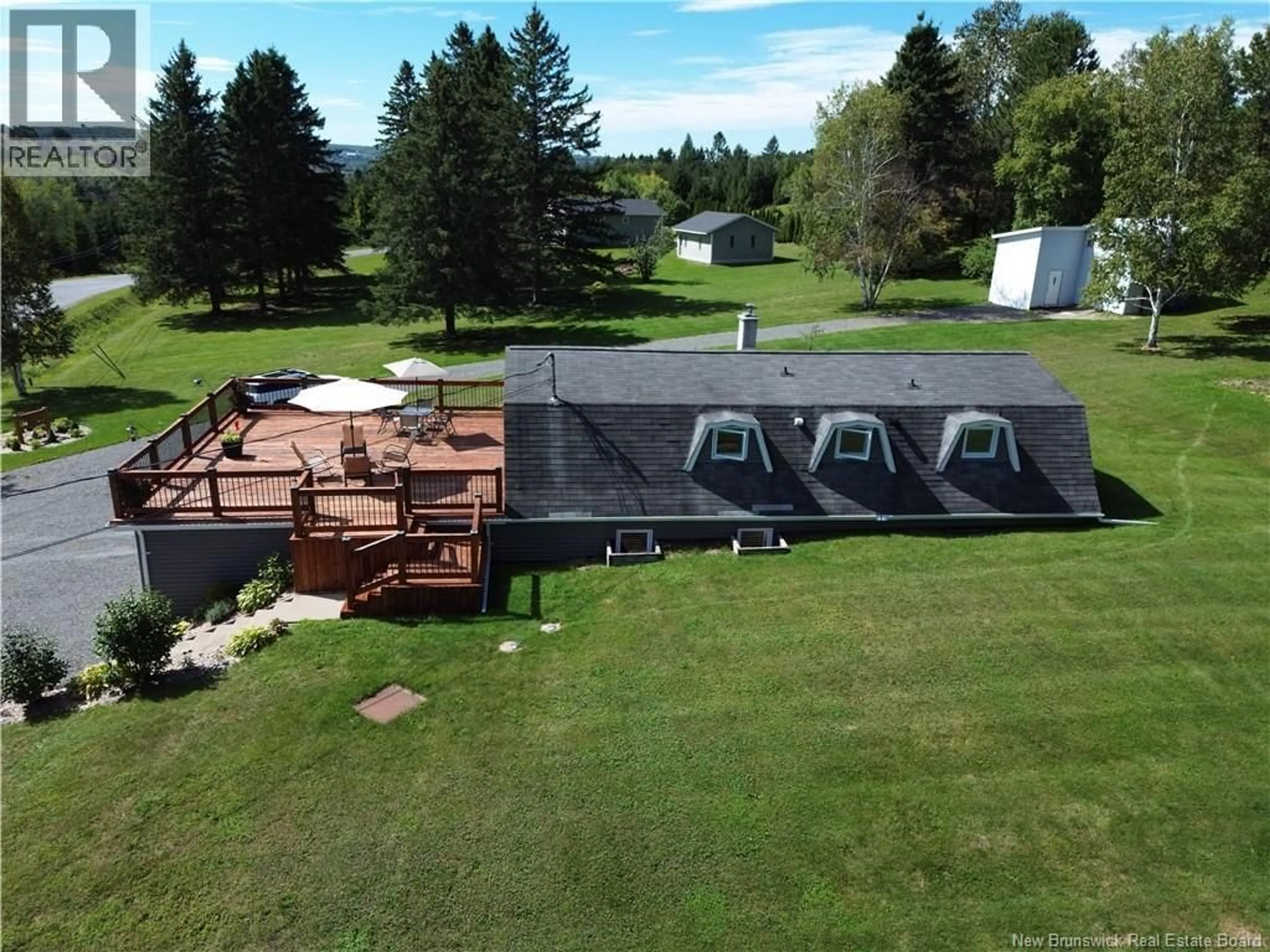 A pic from outside/outdoor area/front of a property/back of a property/a pic from drone, unknown for 12 CARON ROAD, DSL de Drummond/DSL of Drummond New Brunswick E3Y1M7