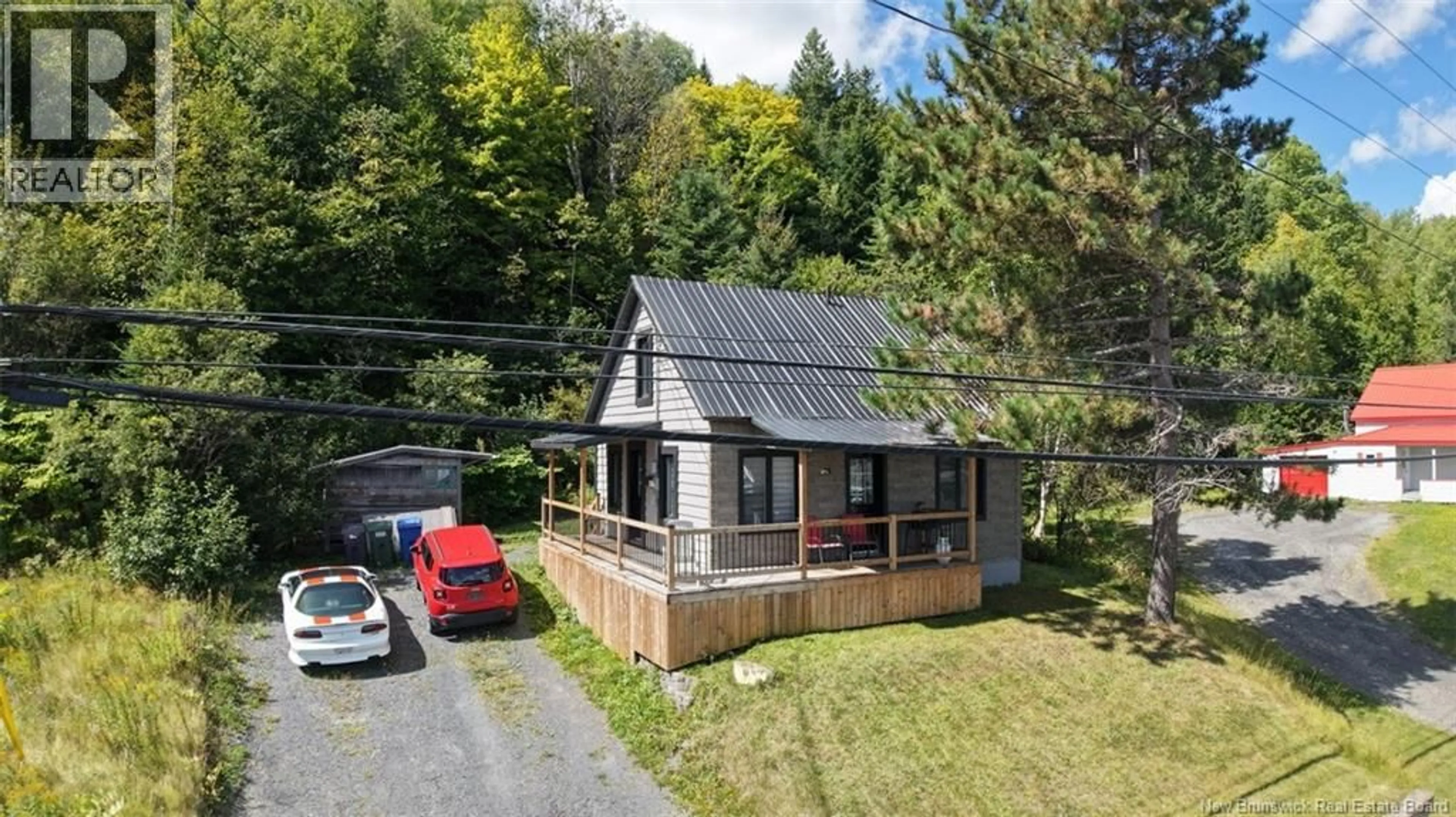 A pic from outside/outdoor area/front of a property/back of a property/a pic from drone, street for 644 CANADA ROAD, Edmundston New Brunswick E3V1W4