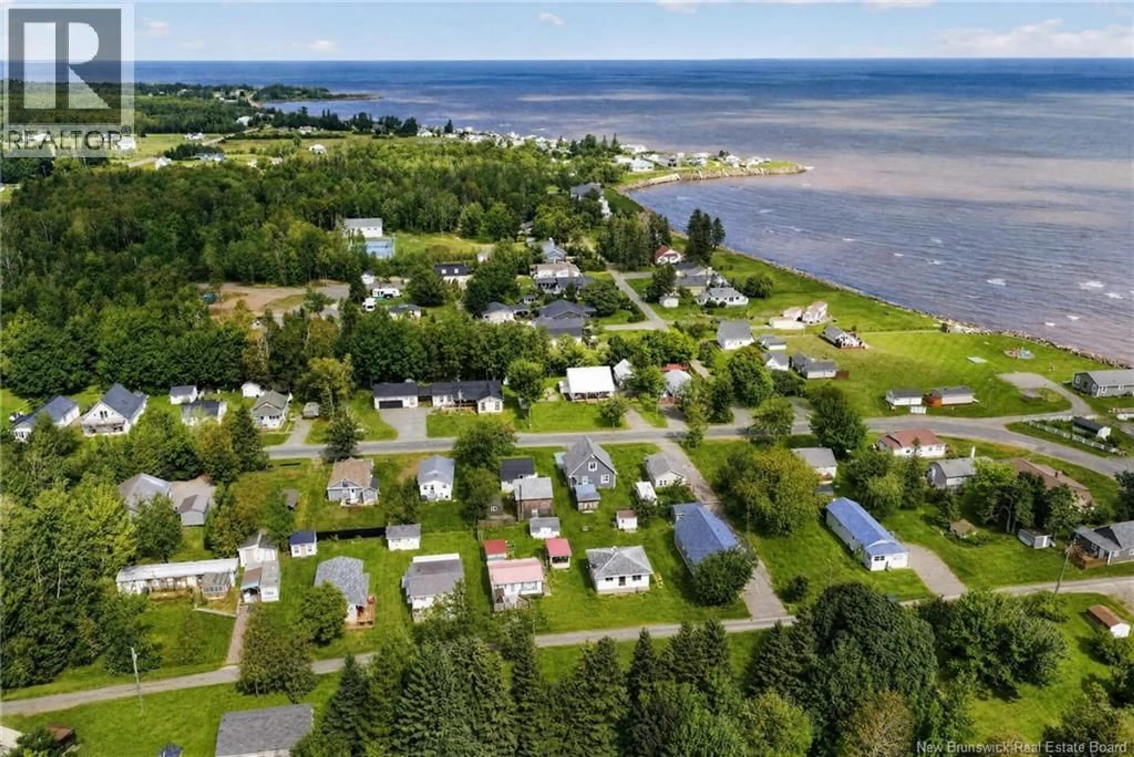 A pic from outside/outdoor area/front of a property/back of a property/a pic from drone, water/lake/river/ocean view for 100 RUE MARGE, Grande-Digue New Brunswick E4R4T6
