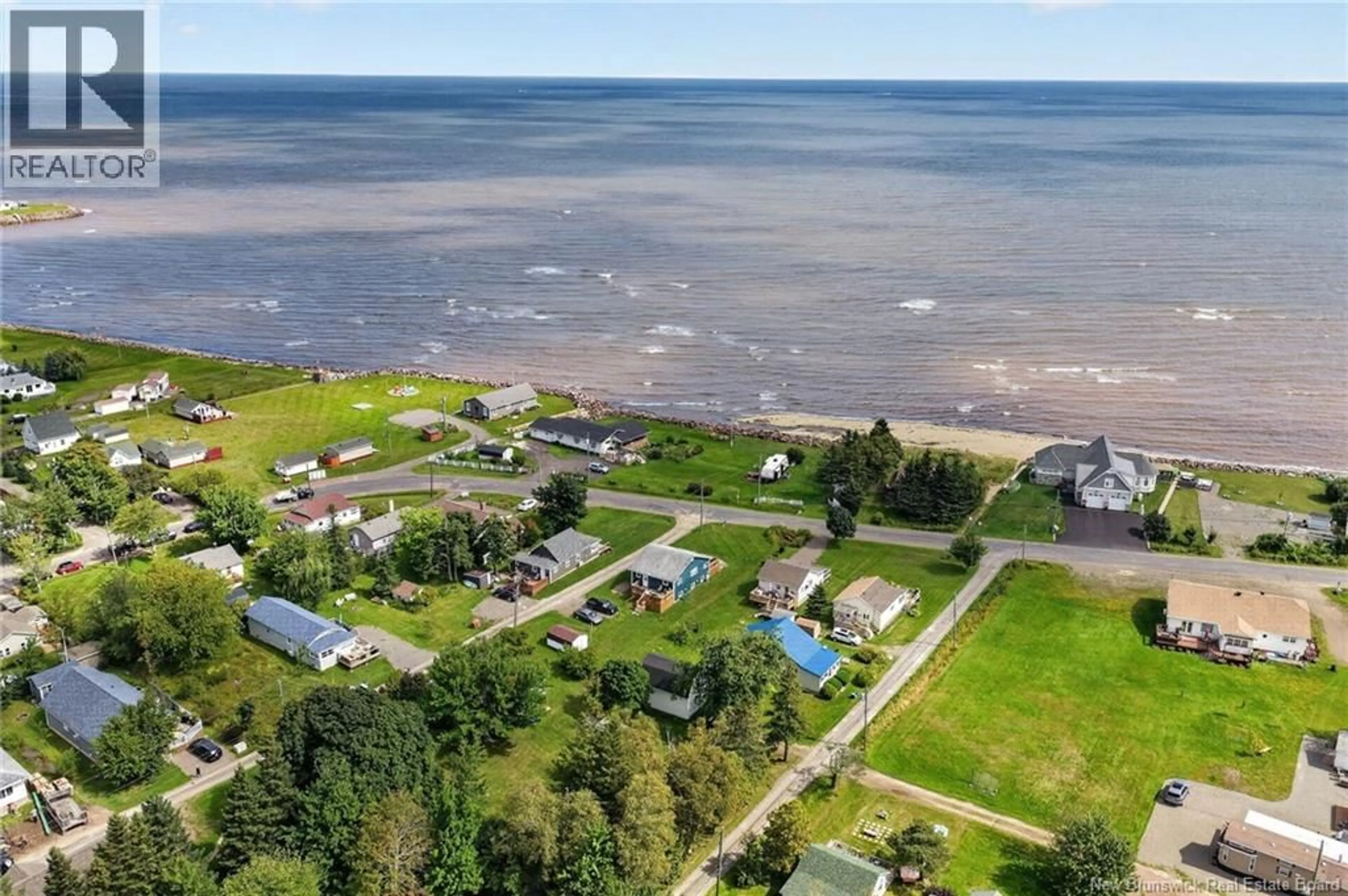 A pic from outside/outdoor area/front of a property/back of a property/a pic from drone, water/lake/river/ocean view for 100 RUE MARGE, Grande-Digue New Brunswick E4R4T6