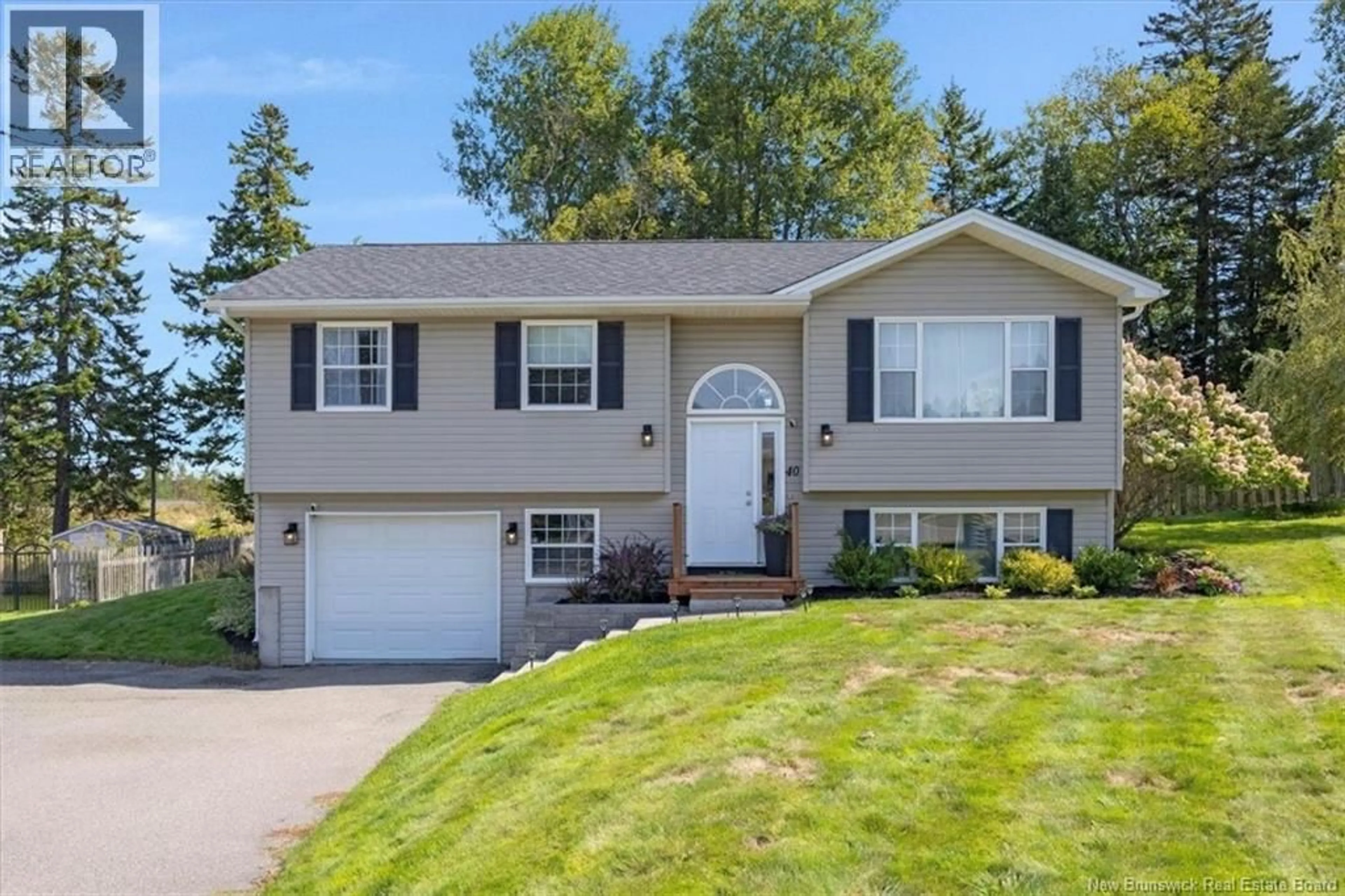 Home with vinyl exterior material, street for 40 GAELIC DRIVE, Saint John New Brunswick E2M5S7