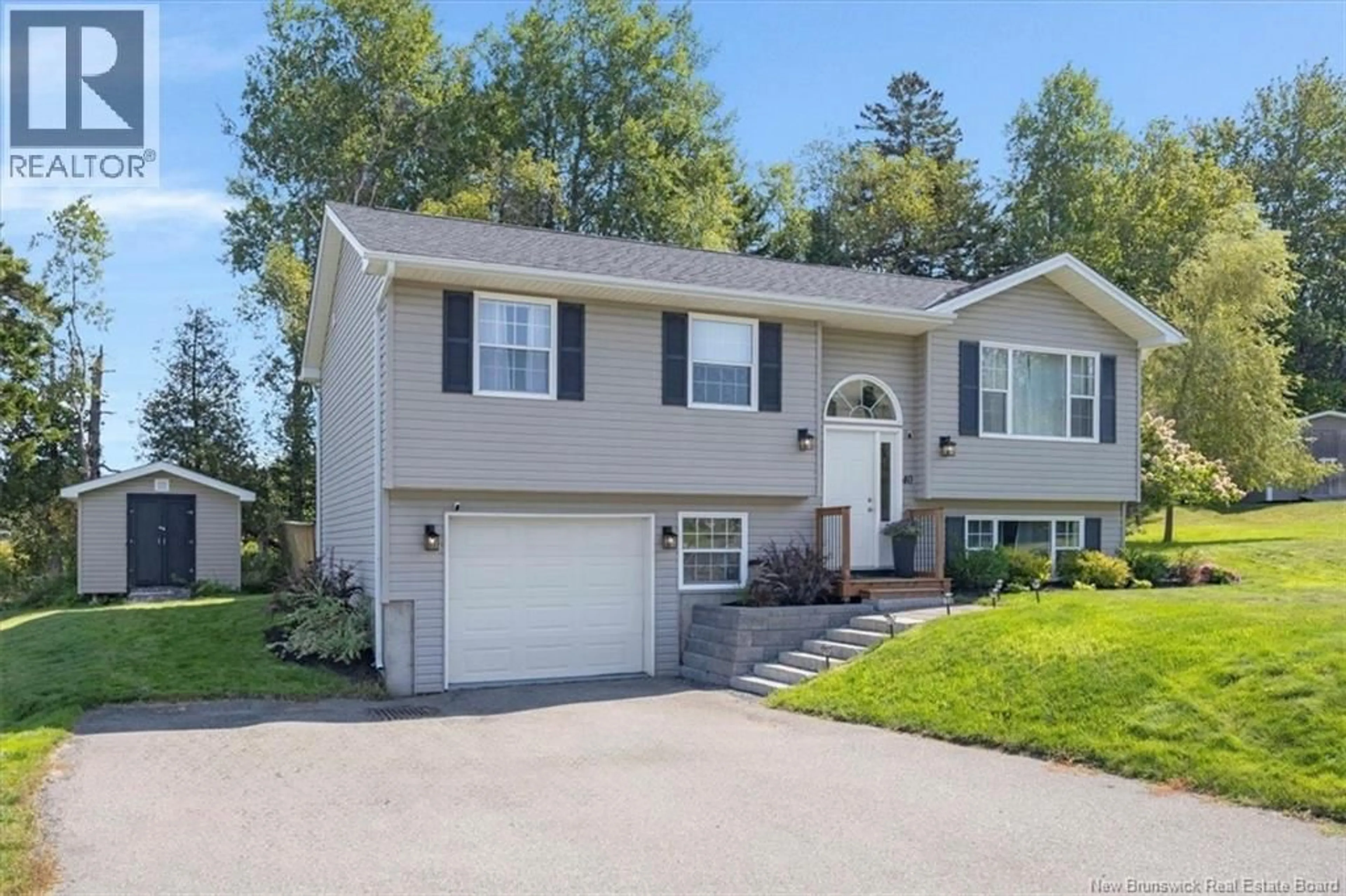 Home with vinyl exterior material, street for 40 GAELIC DRIVE, Saint John New Brunswick E2M5S7