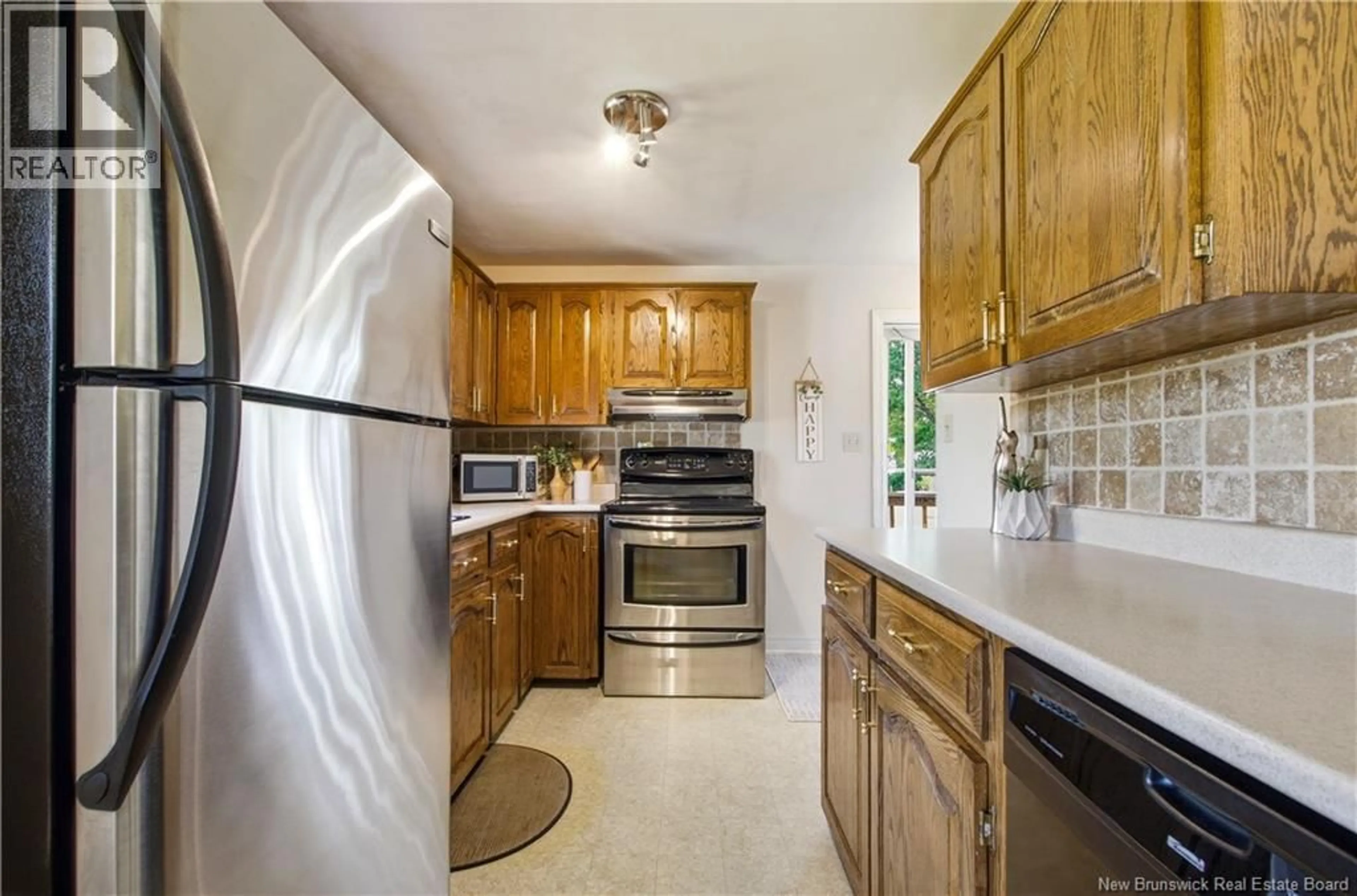 Standard kitchen, ceramic/tile floor for 123 MCADAM AVE, Fredericton New Brunswick E3A1G7