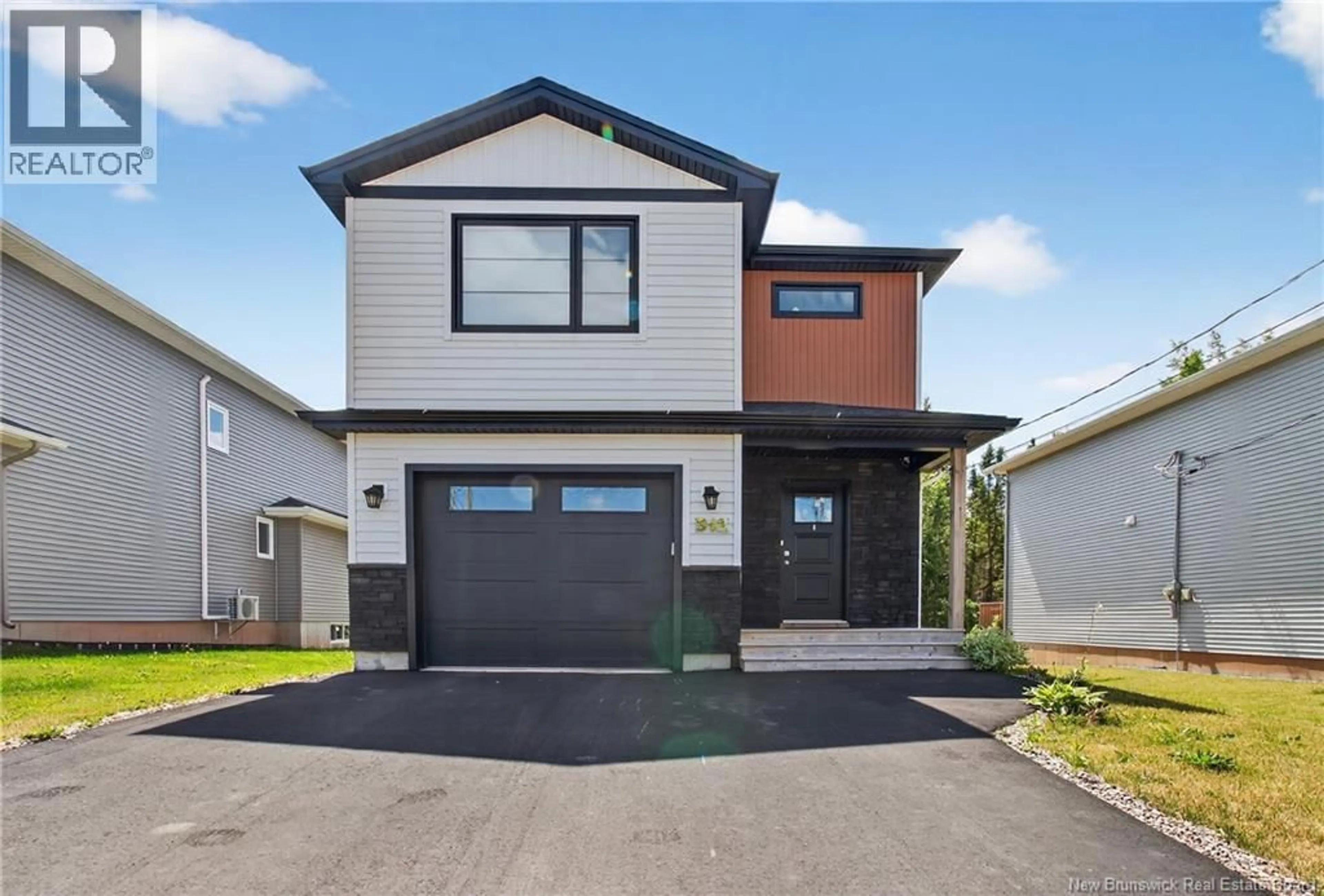 Home with vinyl exterior material, street for 512 MAPLEHURST DRIVE, Moncton New Brunswick E1G6E2
