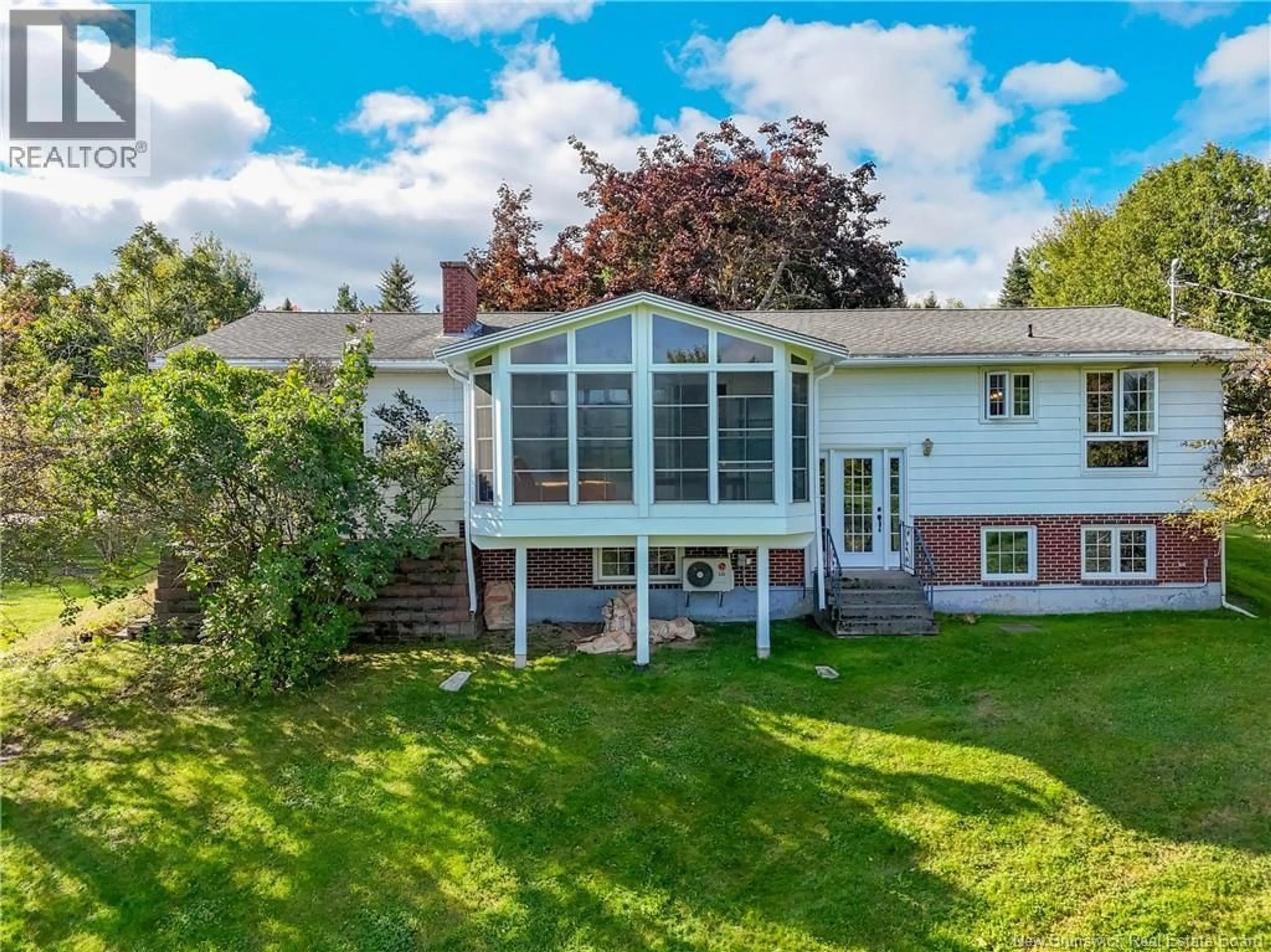 A pic from outside/outdoor area/front of a property/back of a property/a pic from drone, water/lake/river/ocean view for 9 TULIP STREET, Fredericton New Brunswick E3C1L4