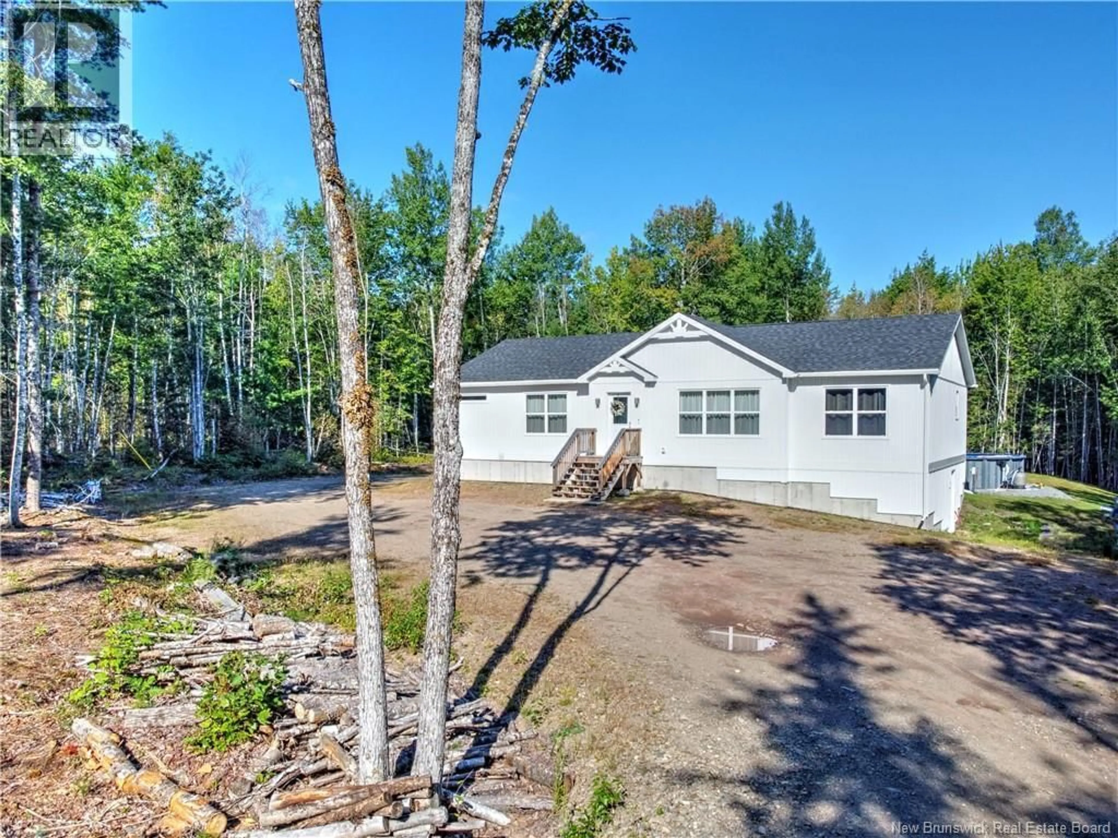 A pic from outside/outdoor area/front of a property/back of a property/a pic from drone, unknown for 124 DIAMOND SQUARE ROAD, Fredericton Junction New Brunswick E5L1V3