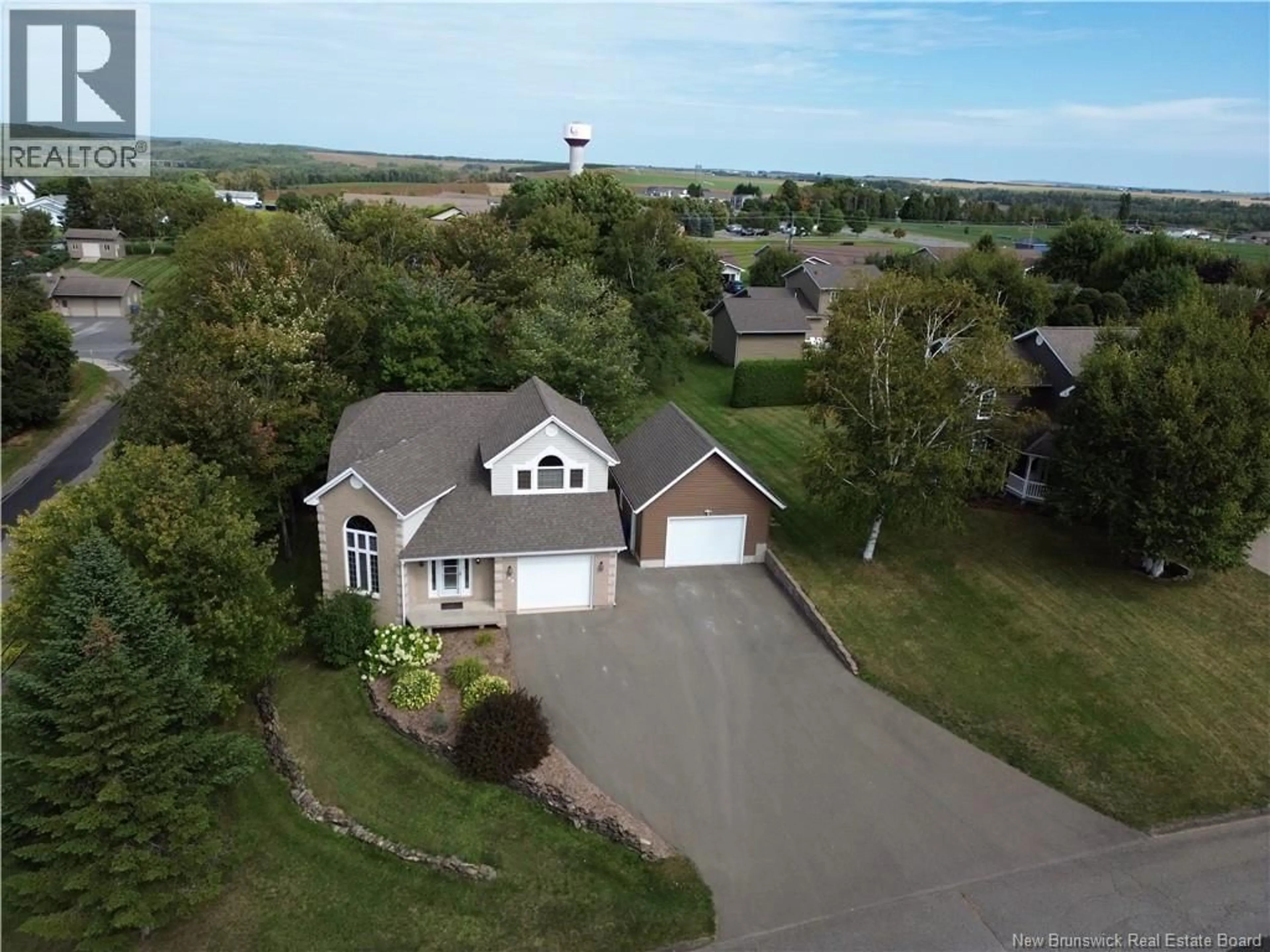 A pic from outside/outdoor area/front of a property/back of a property/a pic from drone, unknown for 200 ST. AMAND STREET, Grand Falls New Brunswick E3Y1C8