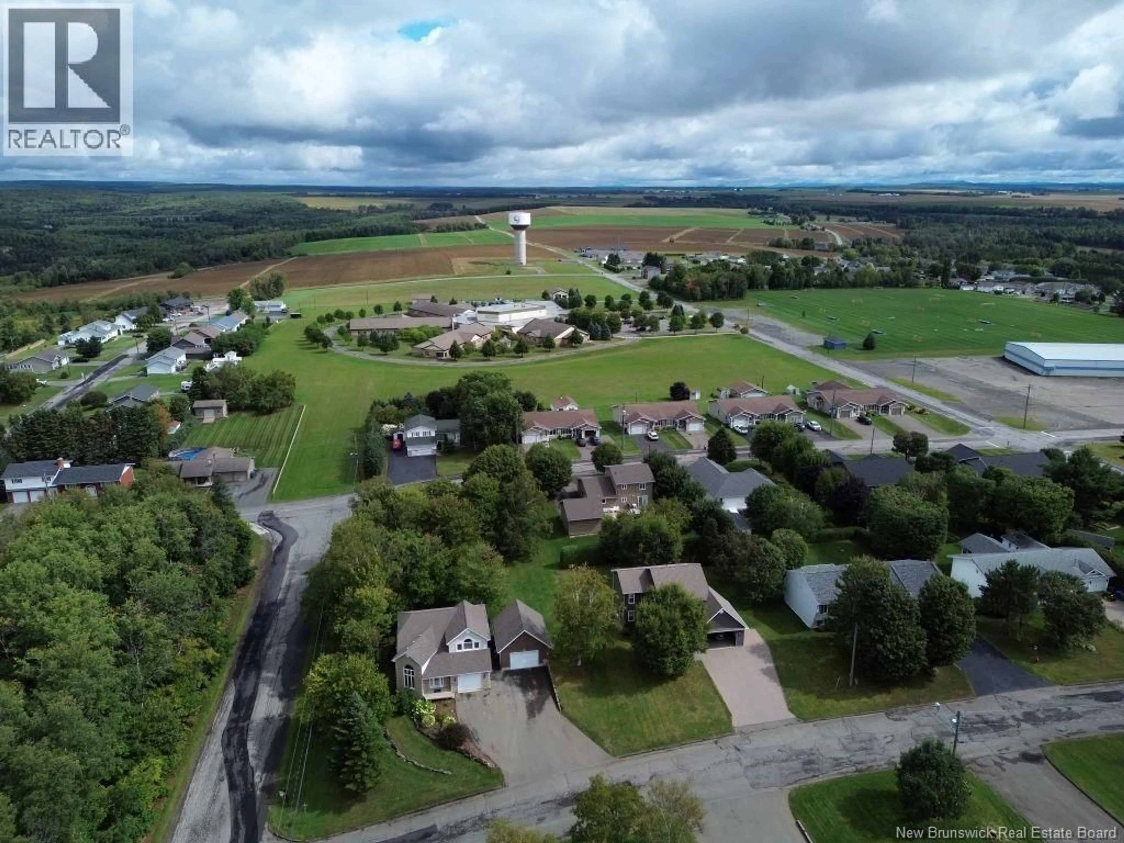 A pic from outside/outdoor area/front of a property/back of a property/a pic from drone, unknown for 200 ST. AMAND STREET, Grand Falls New Brunswick E3Y1C8