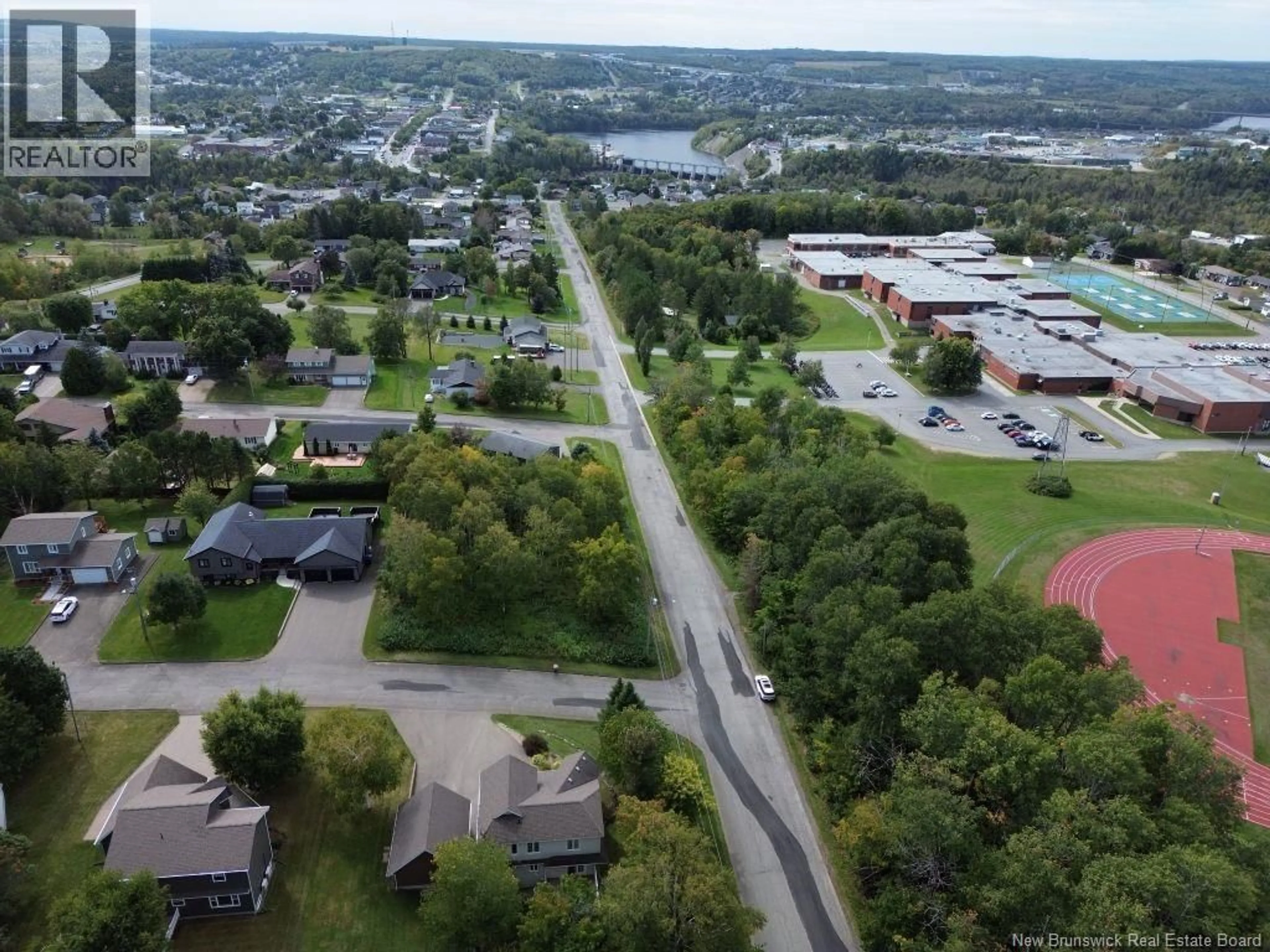 A pic from outside/outdoor area/front of a property/back of a property/a pic from drone, unknown for 200 ST. AMAND STREET, Grand Falls New Brunswick E3Y1C8
