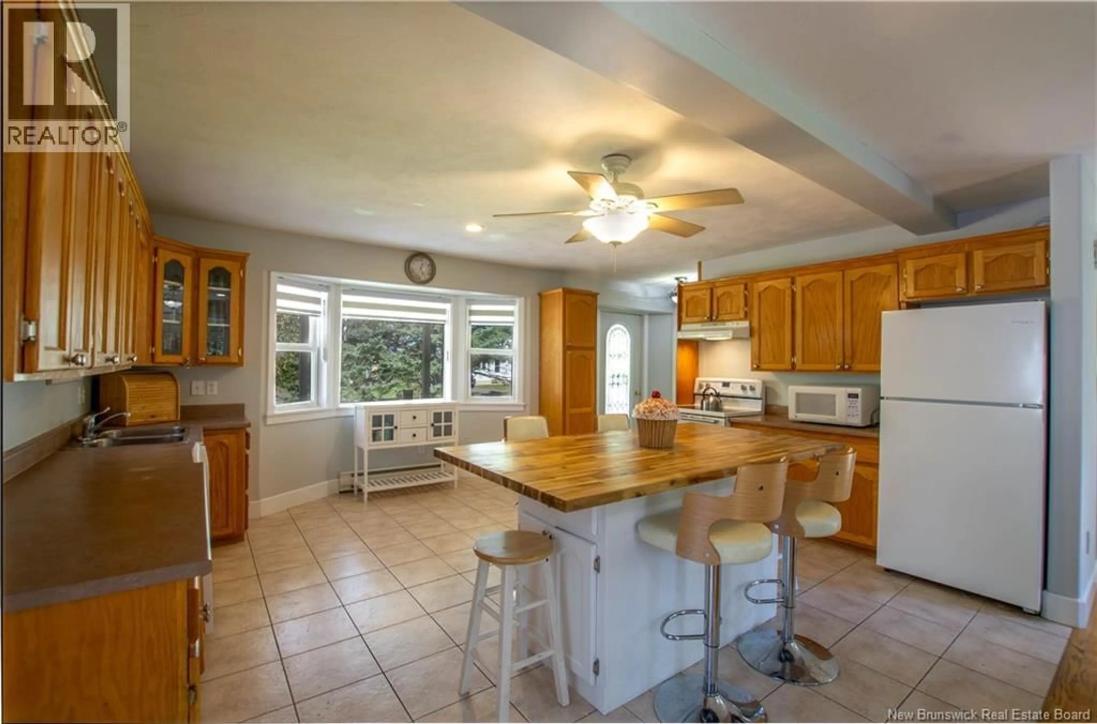 Open concept kitchen, ceramic/tile floor for 15 DORAL AVENUE, Saint-Antoine New Brunswick E4V4K2