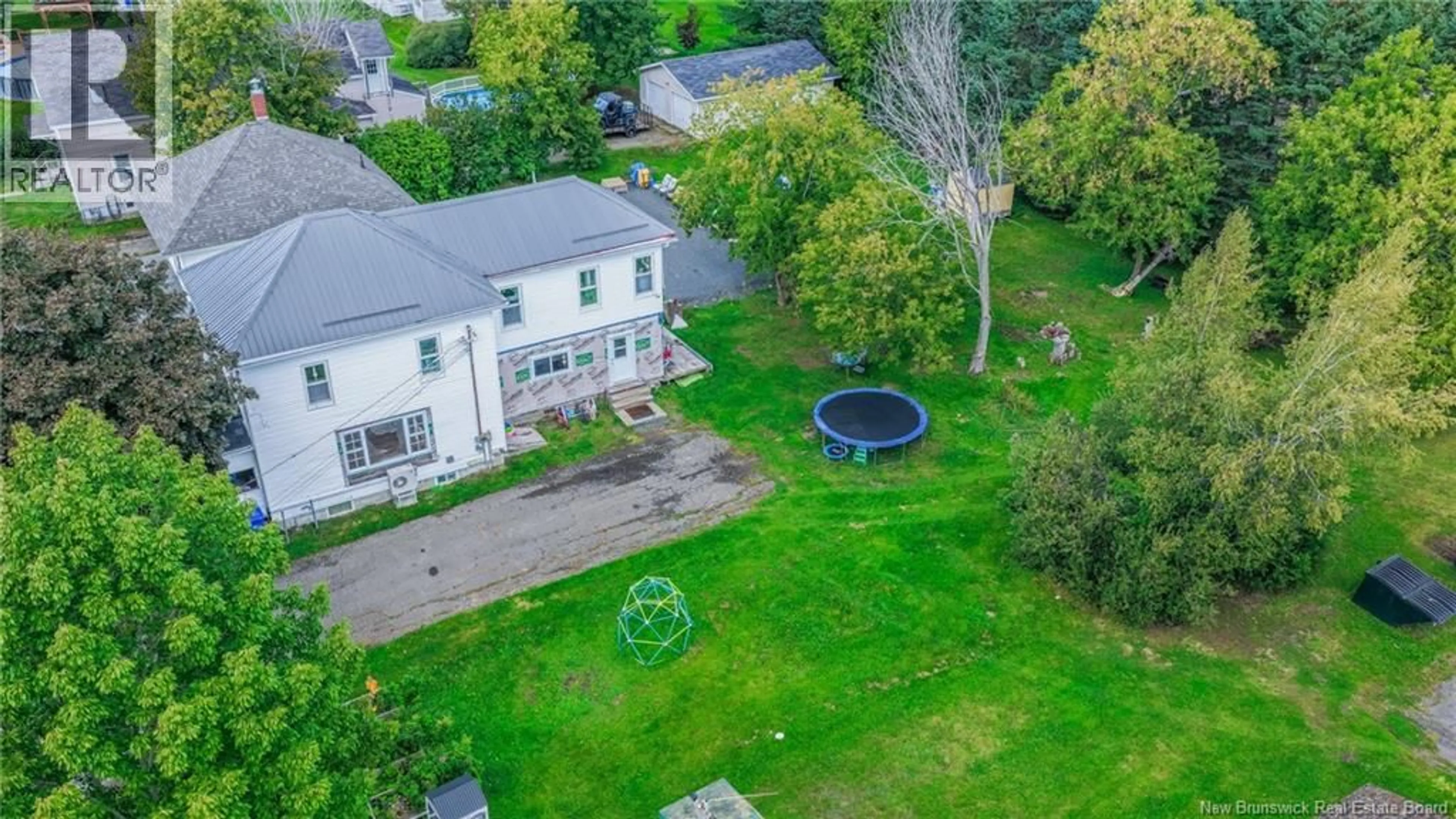 A pic from outside/outdoor area/front of a property/back of a property/a pic from drone, street for 9 TILLEY STREET, St. Stephen New Brunswick E3L2T1