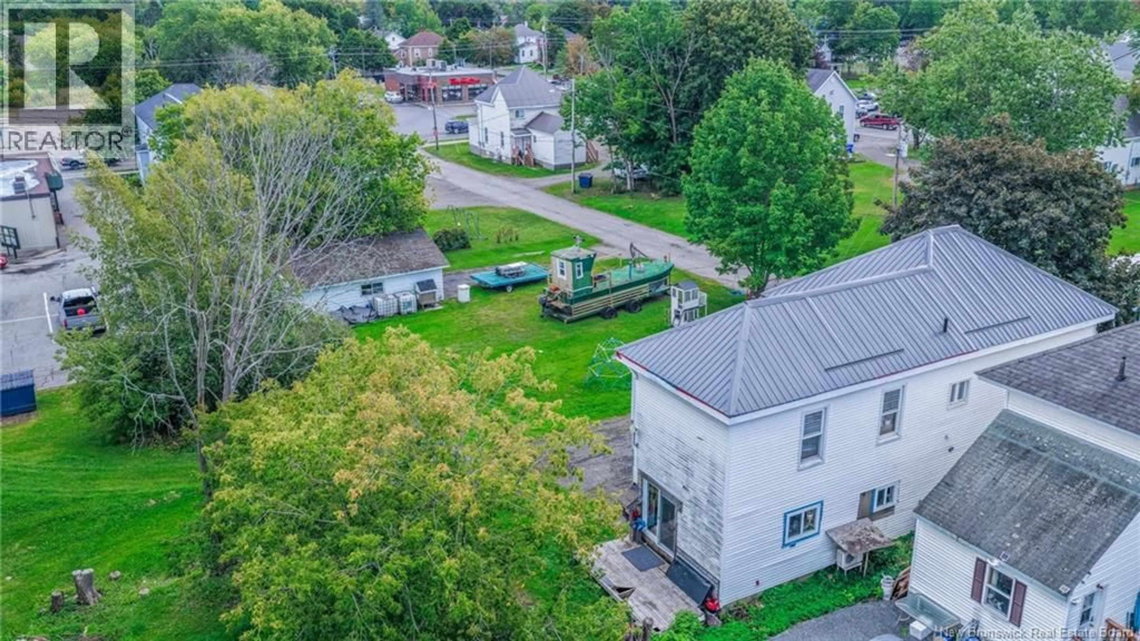A pic from outside/outdoor area/front of a property/back of a property/a pic from drone, street for 9 TILLEY STREET, St. Stephen New Brunswick E3L2T1