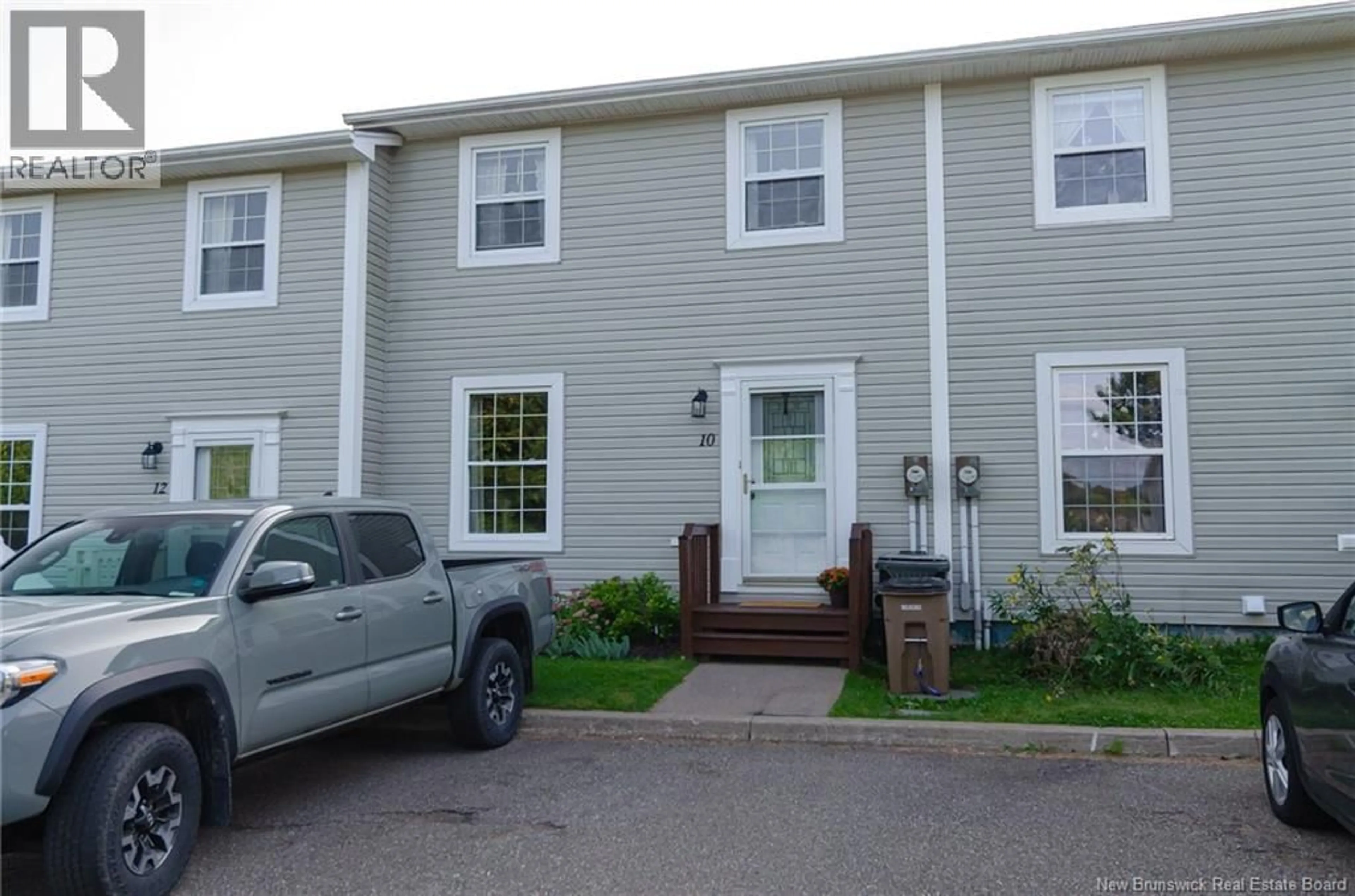 Home with vinyl exterior material, street for 10 HONEYSUCKLE DRIVE, Saint John New Brunswick E2M5X4