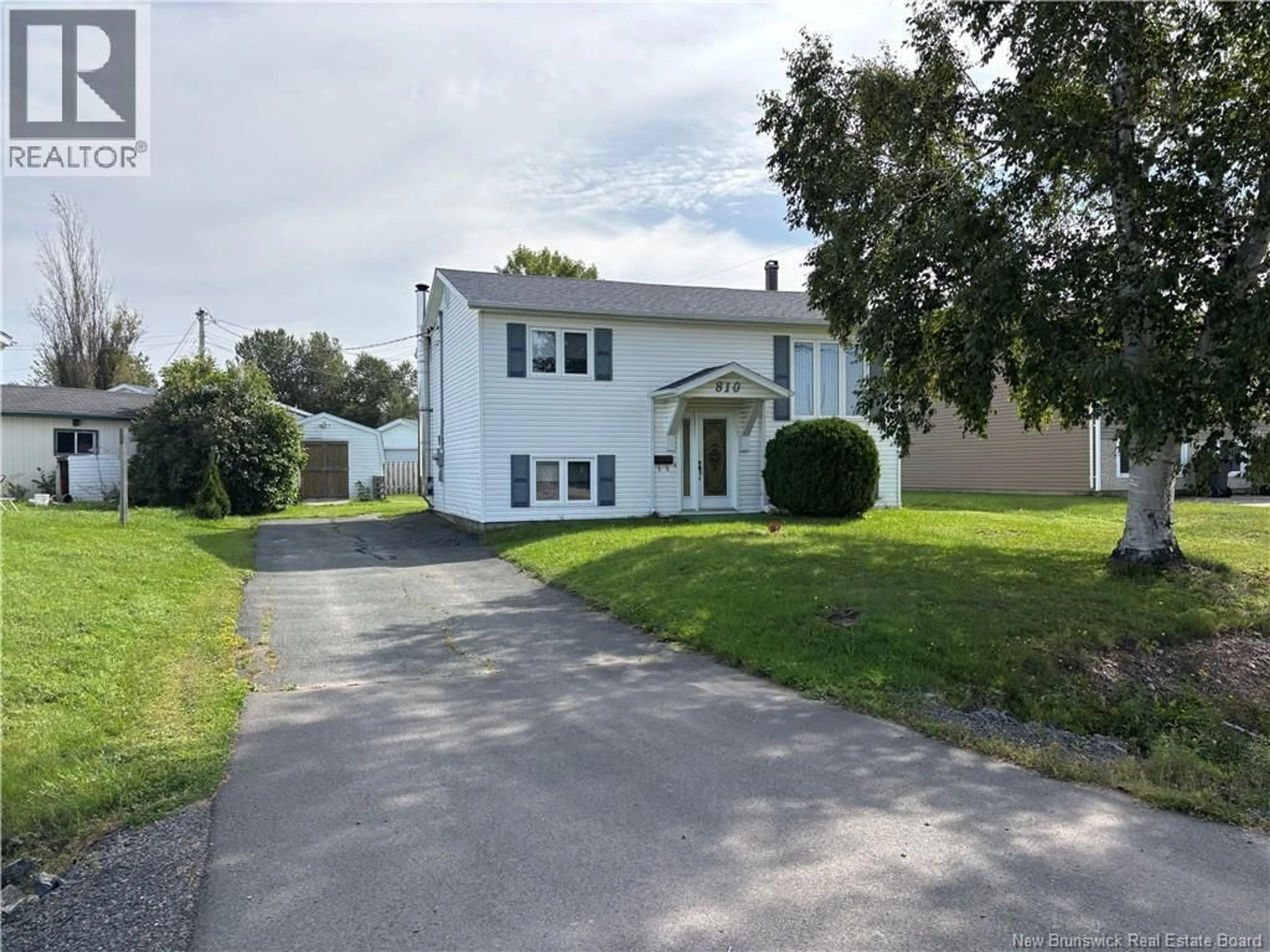 A pic from outside/outdoor area/front of a property/back of a property/a pic from drone, street for 810 COUTURE STREET, Bathurst New Brunswick E2A2E9