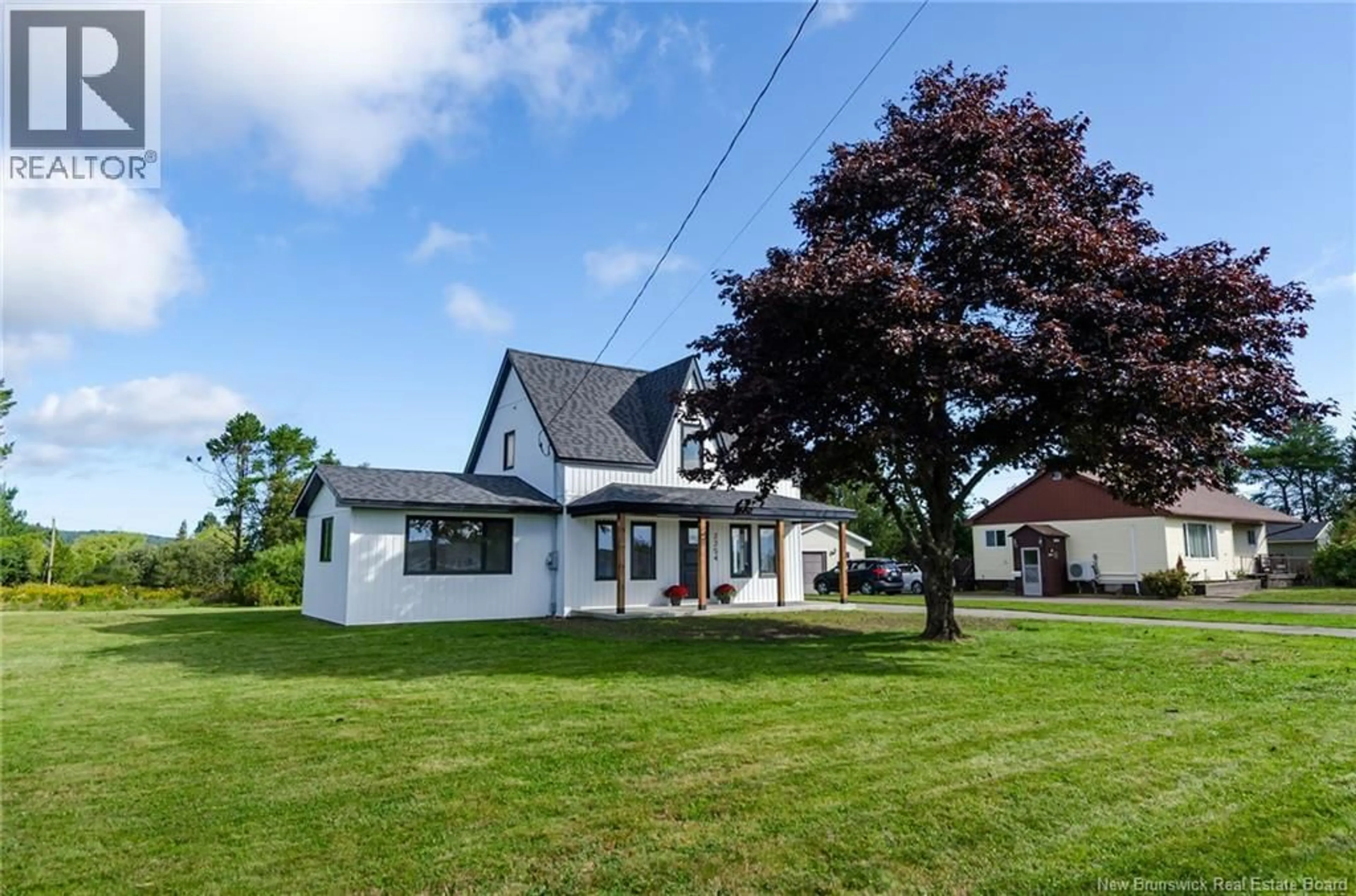 A pic from outside/outdoor area/front of a property/back of a property/a pic from drone, street for 2254 OCEAN WESTWAY, Saint John New Brunswick E2M5G2