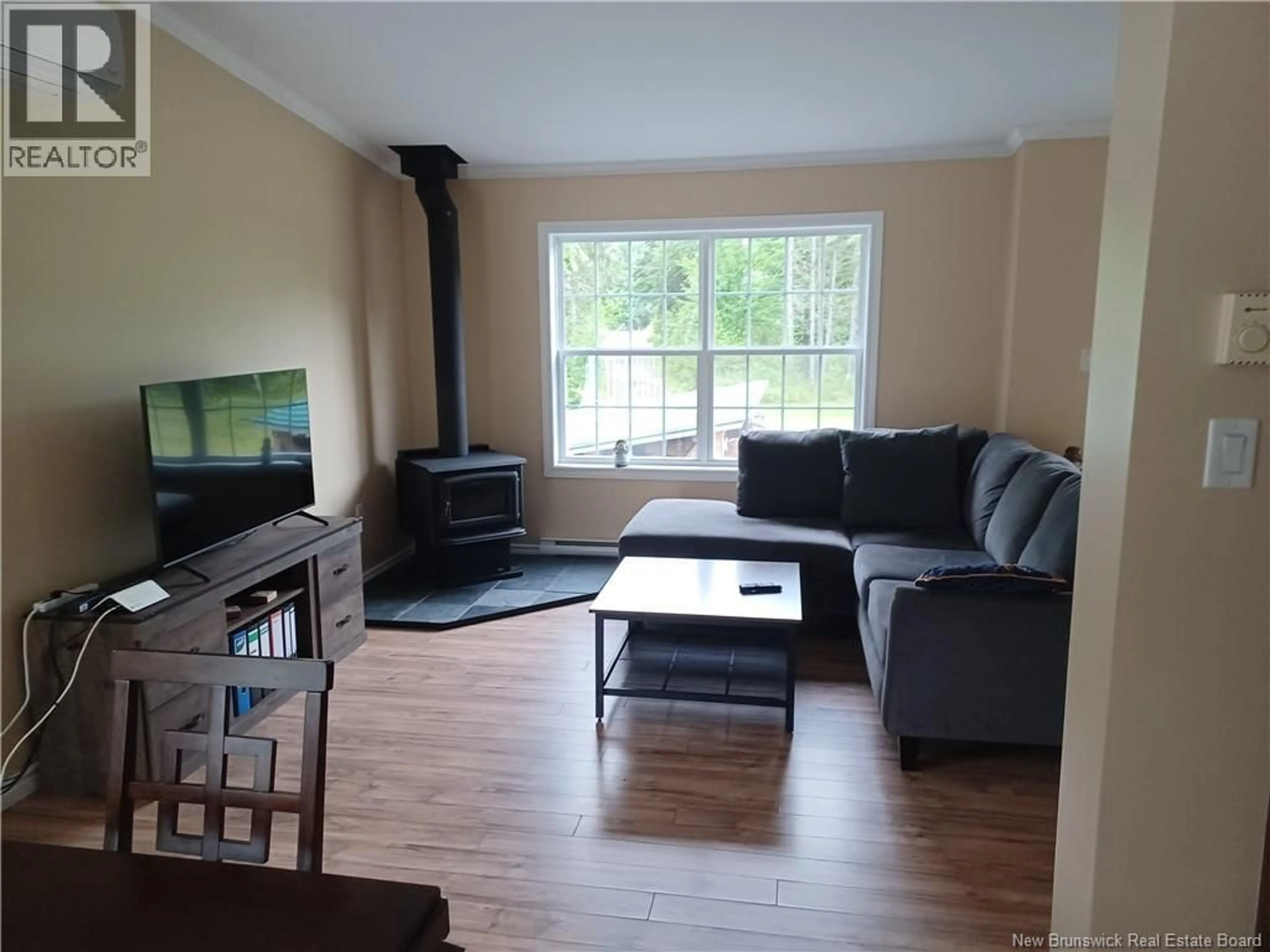 Living room with furniture, wood/laminate floor for 534 BLACK RIVER ROAD, Black River Bridge New Brunswick E1N5S5