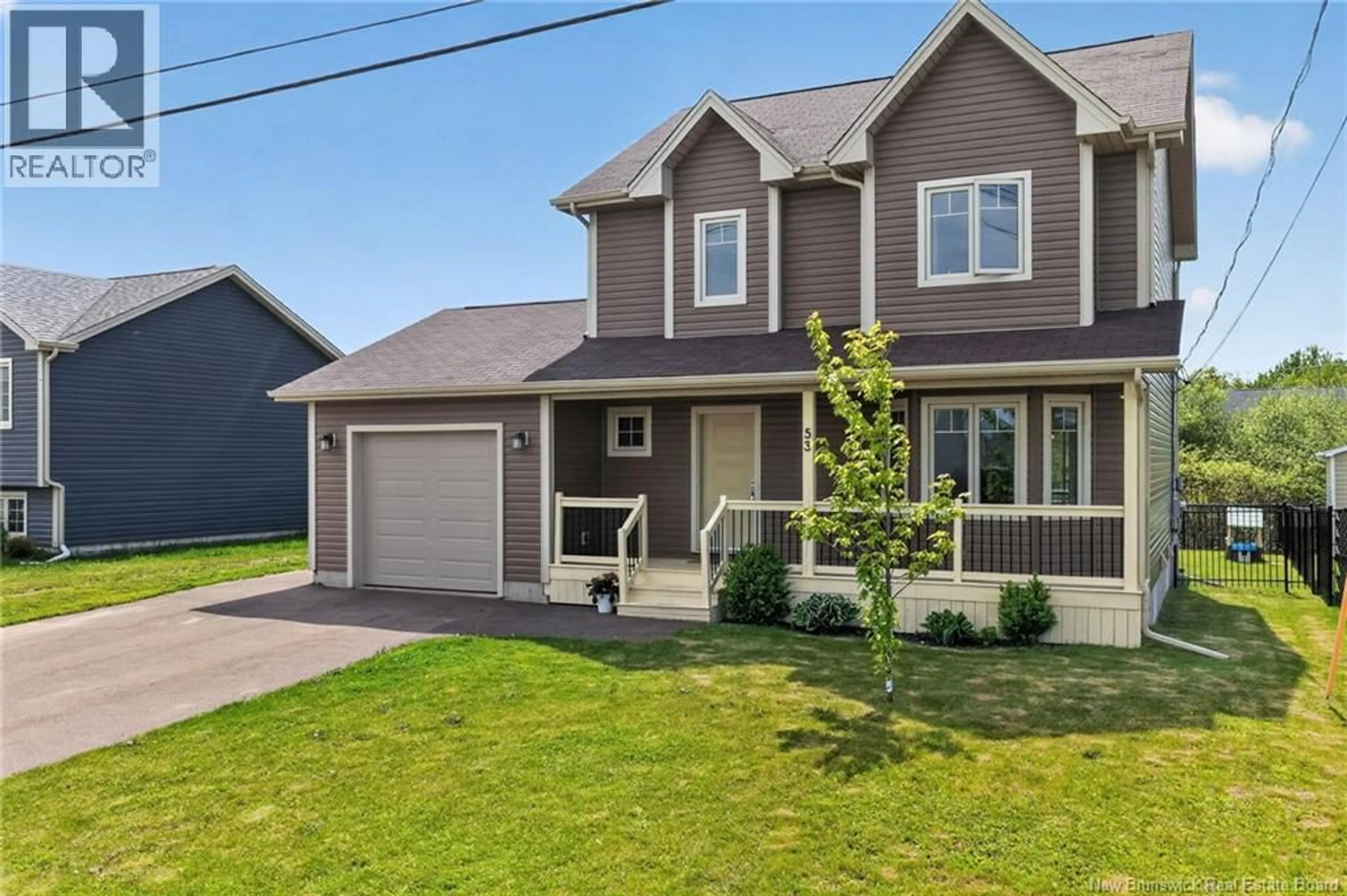 Home with vinyl exterior material, street for 53 LAFOREST STREET, Shediac New Brunswick E4P0P7
