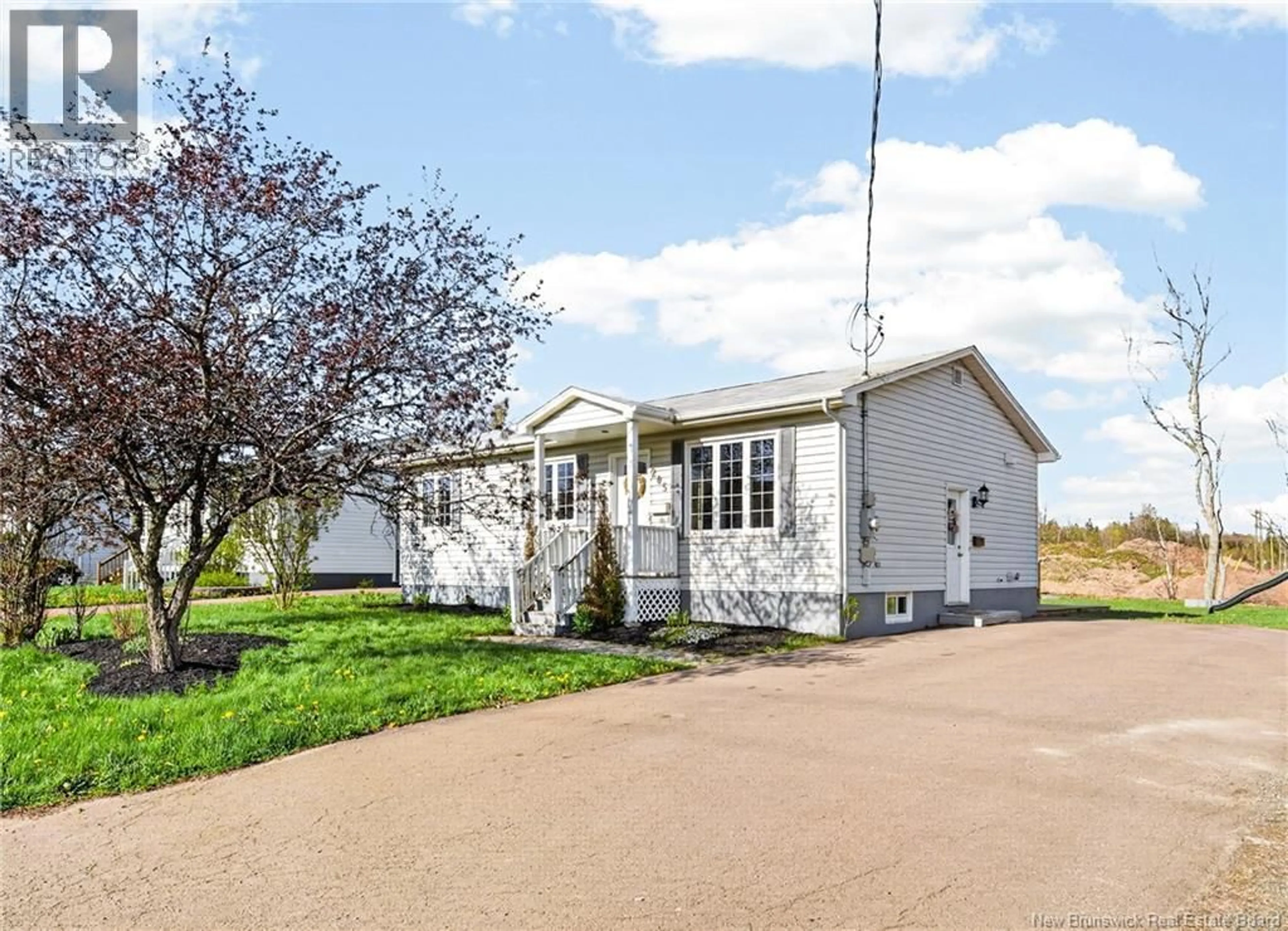 Home with vinyl exterior material, street for 205 THOMAS STREET, Dieppe New Brunswick E1A2C3