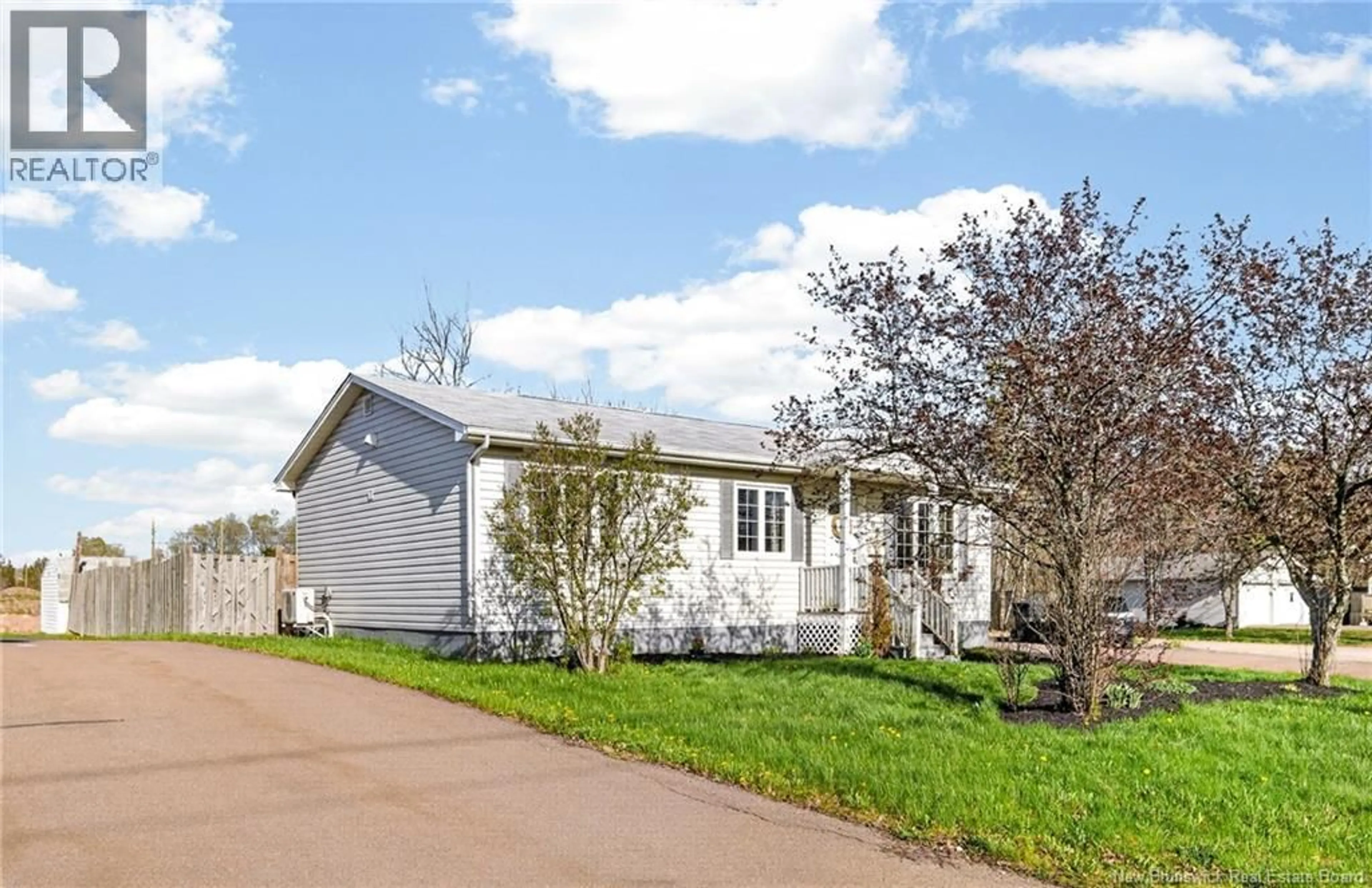 Home with vinyl exterior material, street for 205 THOMAS STREET, Dieppe New Brunswick E1A2C3