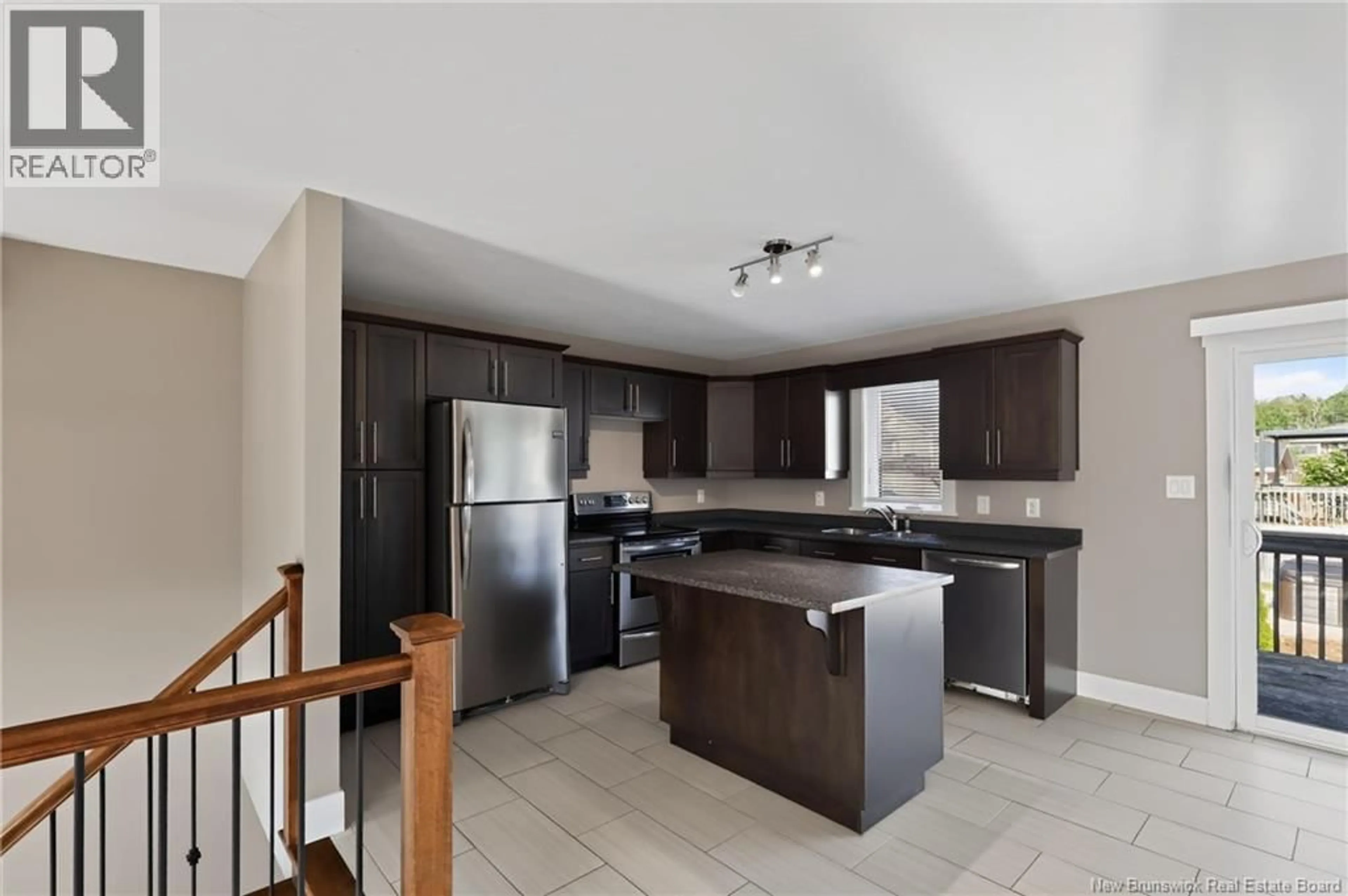 Open concept kitchen, ceramic/tile floor for 27 CUMBERLAND, Moncton New Brunswick E1G0Z9