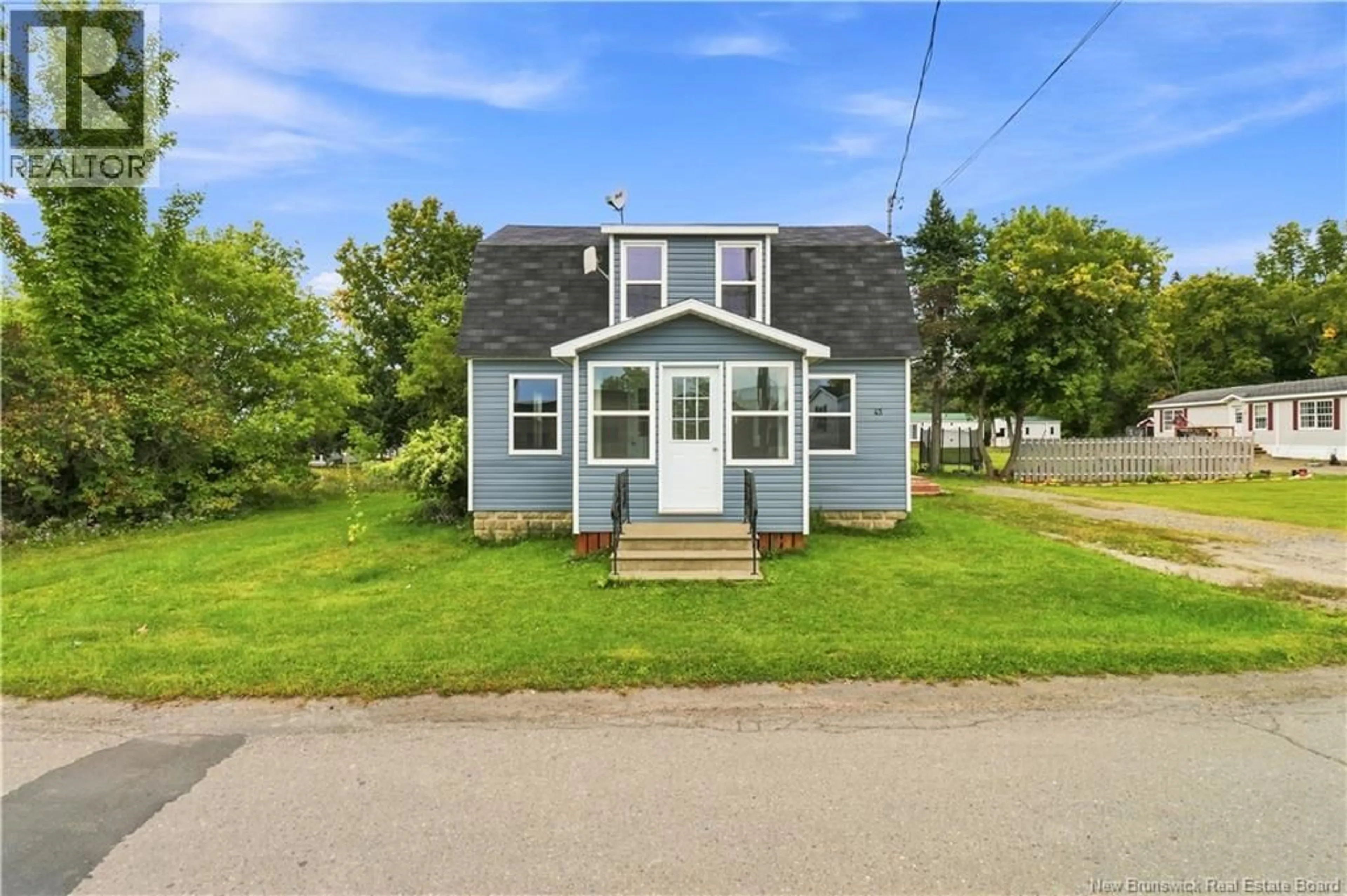 Home with vinyl exterior material, street for 43 HILLCREST AVENUE, Hartland New Brunswick E7P1M7