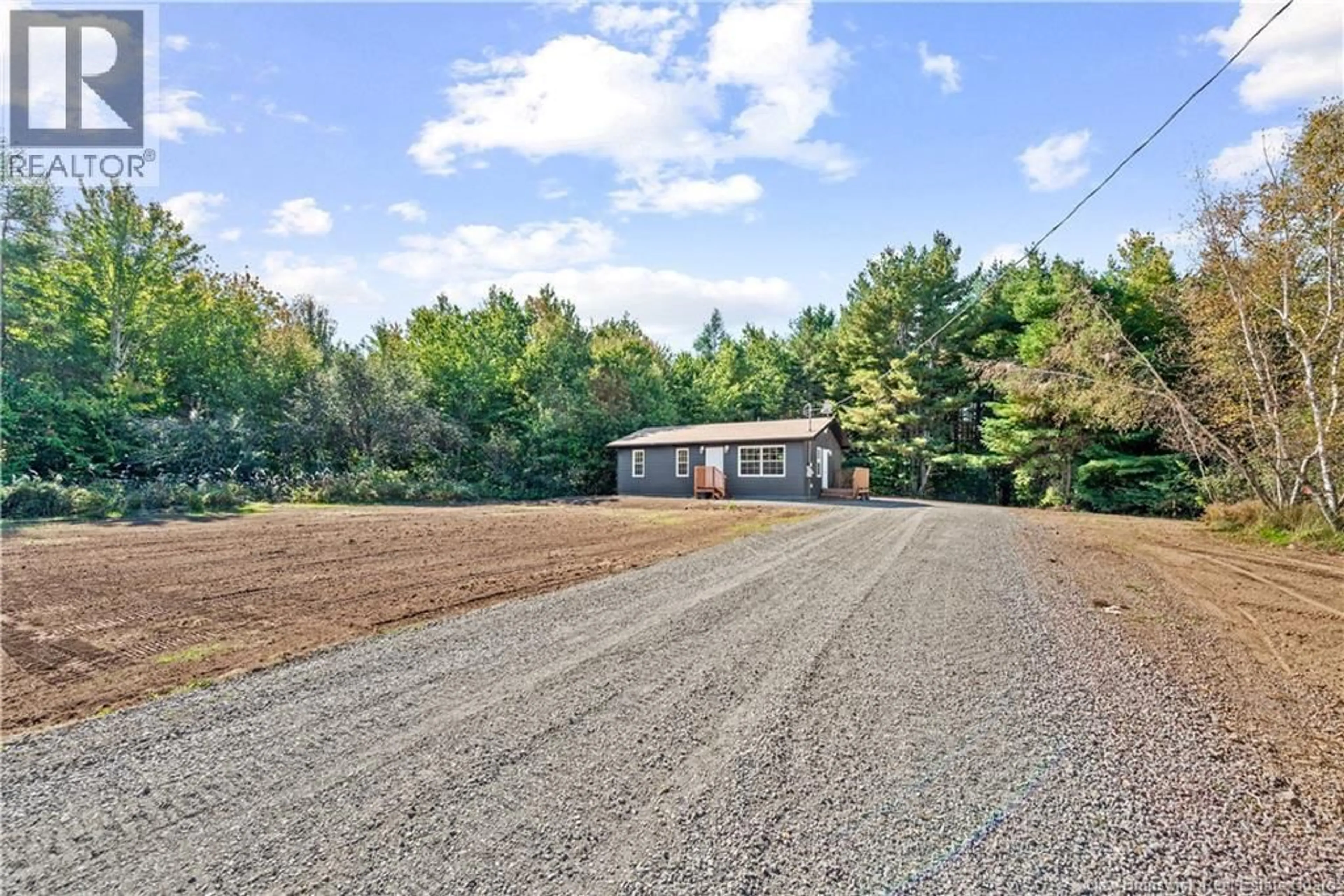 A pic from outside/outdoor area/front of a property/back of a property/a pic from drone, street for 76 ALBAN RICHARD ROAD, Saint-Ignace New Brunswick E4X2A7