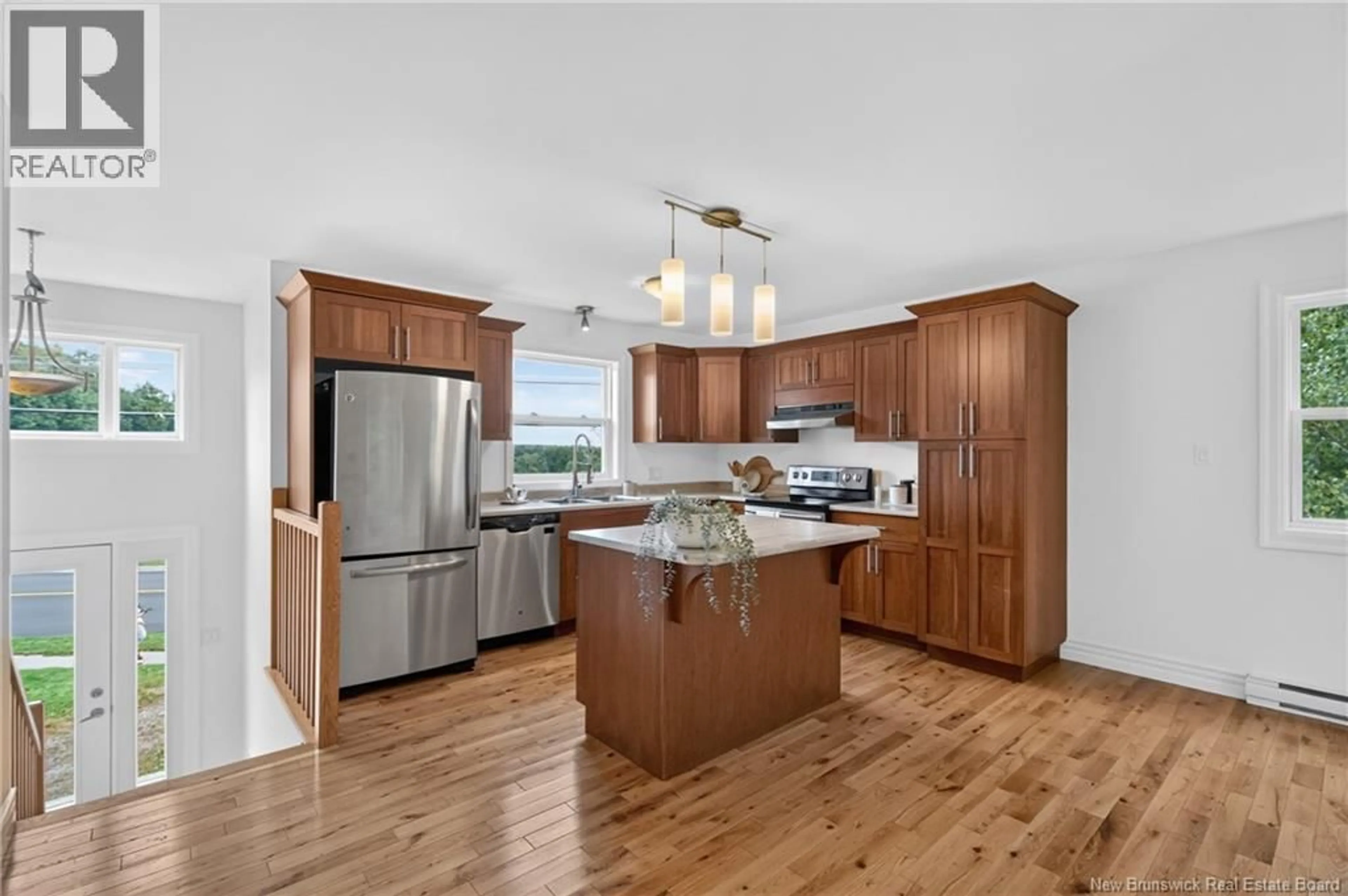 Open concept kitchen, wood/laminate floor for 1528 LINCOLN ROAD, Fredericton New Brunswick E3B8J6