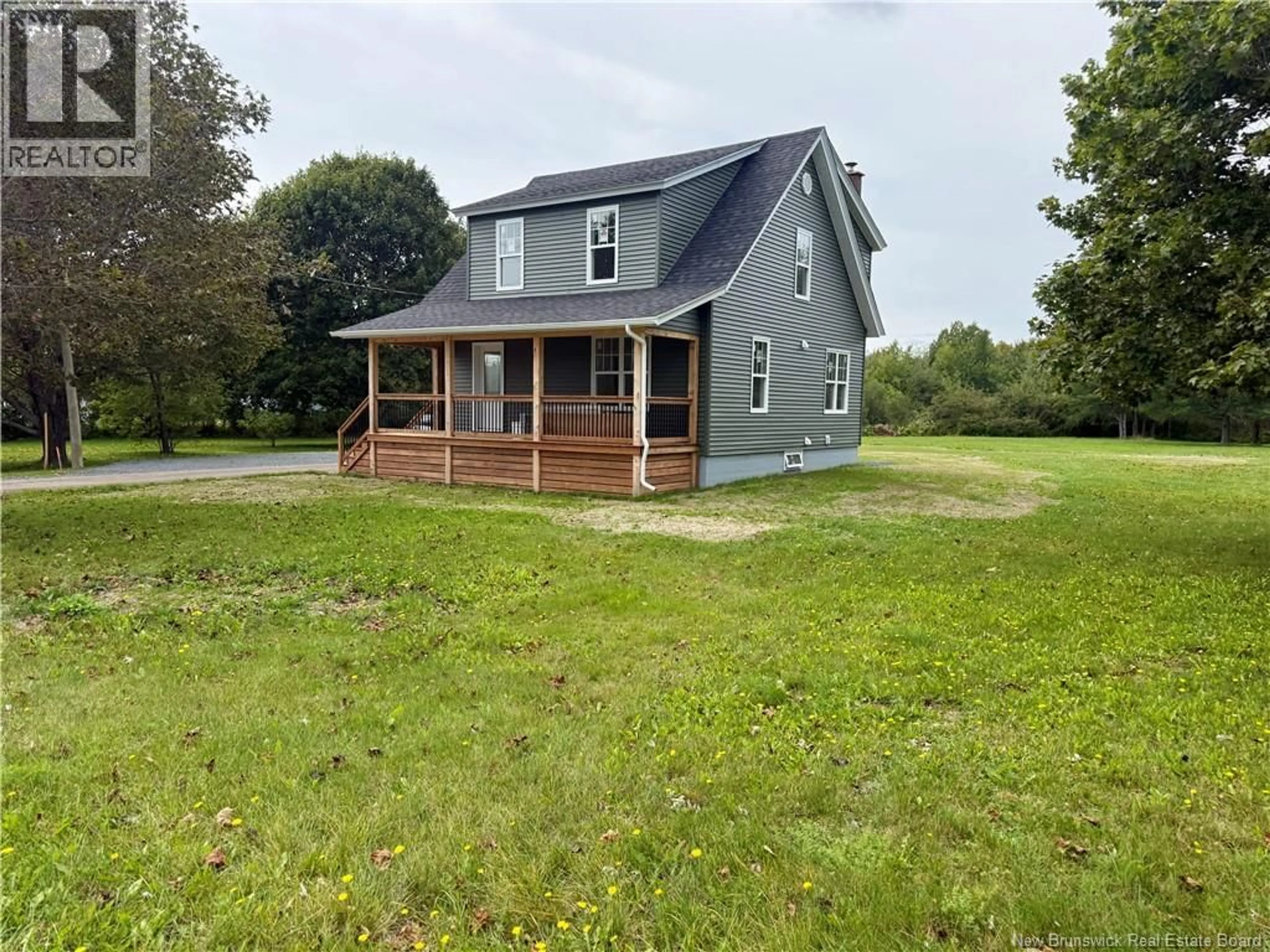 A pic from outside/outdoor area/front of a property/back of a property/a pic from drone, water/lake/river/ocean view for 4069 RUE PRINCIPALE, Tracadie New Brunswick E1X1B7