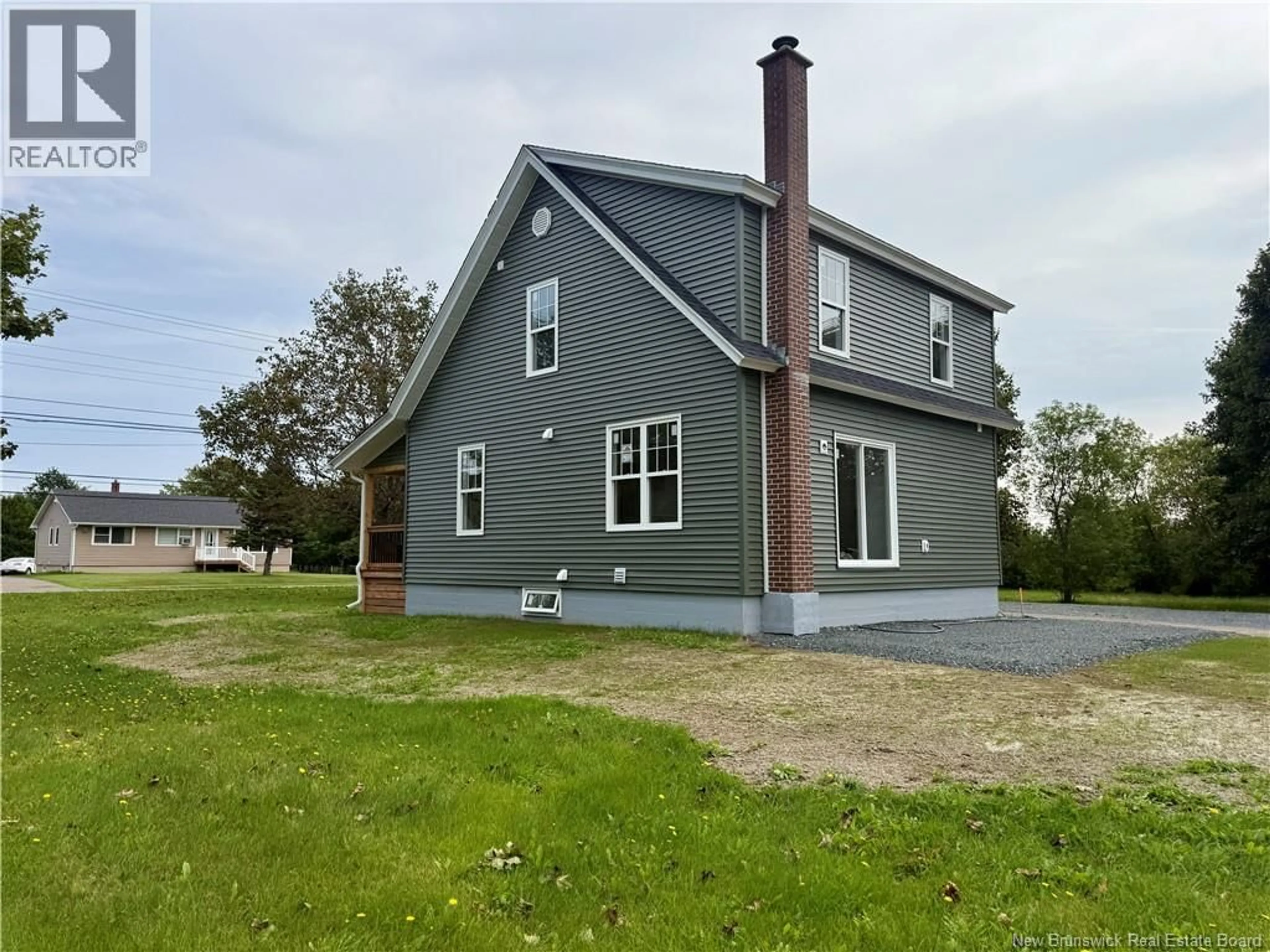 Home with vinyl exterior material, building for 4069 RUE PRINCIPALE, Tracadie New Brunswick E1X1B7