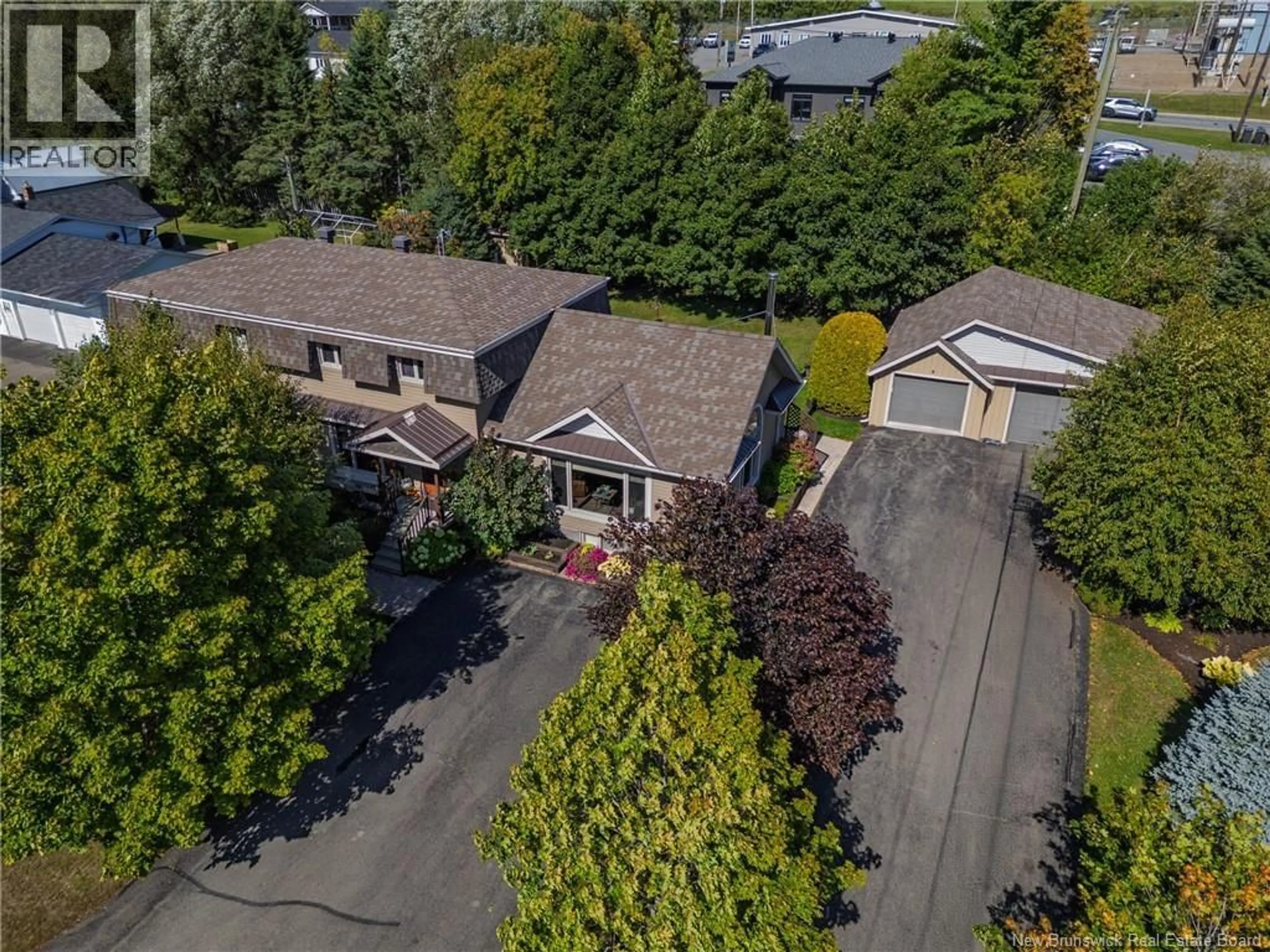 A pic from outside/outdoor area/front of a property/back of a property/a pic from drone, street for 86-88 DOMINIQUE, Grand Falls New Brunswick E3Y1A1