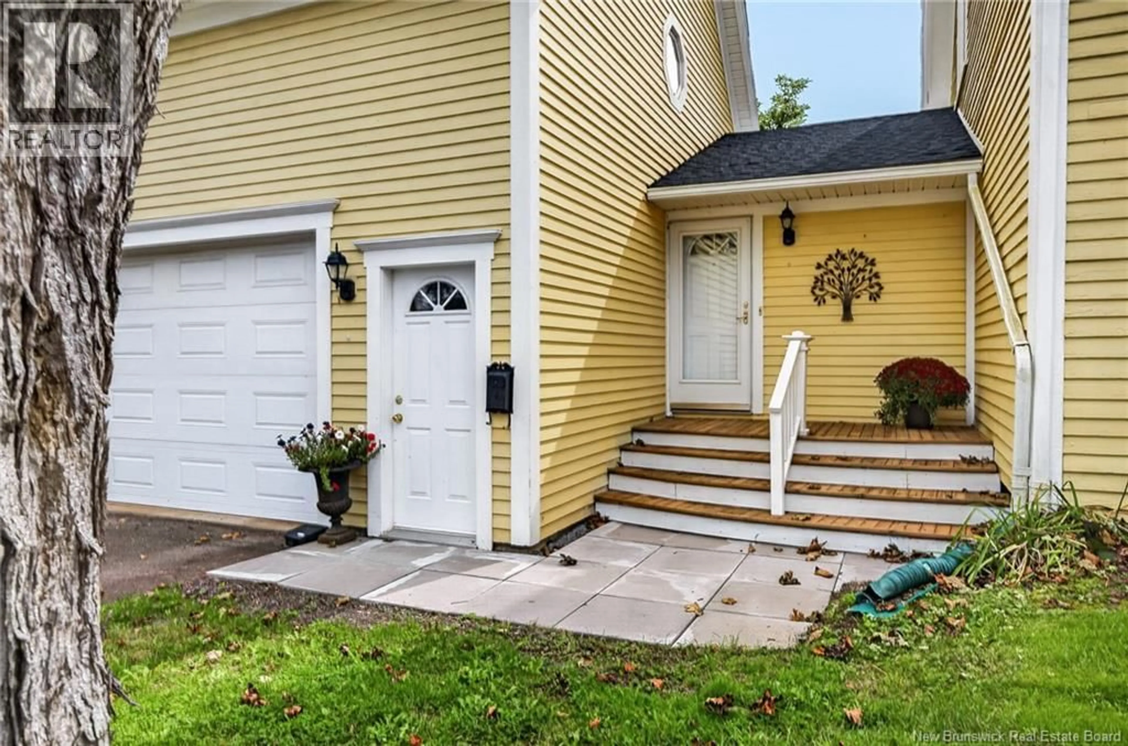 Home with vinyl exterior material, street for 69 ROCKLAND DRIVE, Moncton New Brunswick E1A3T2