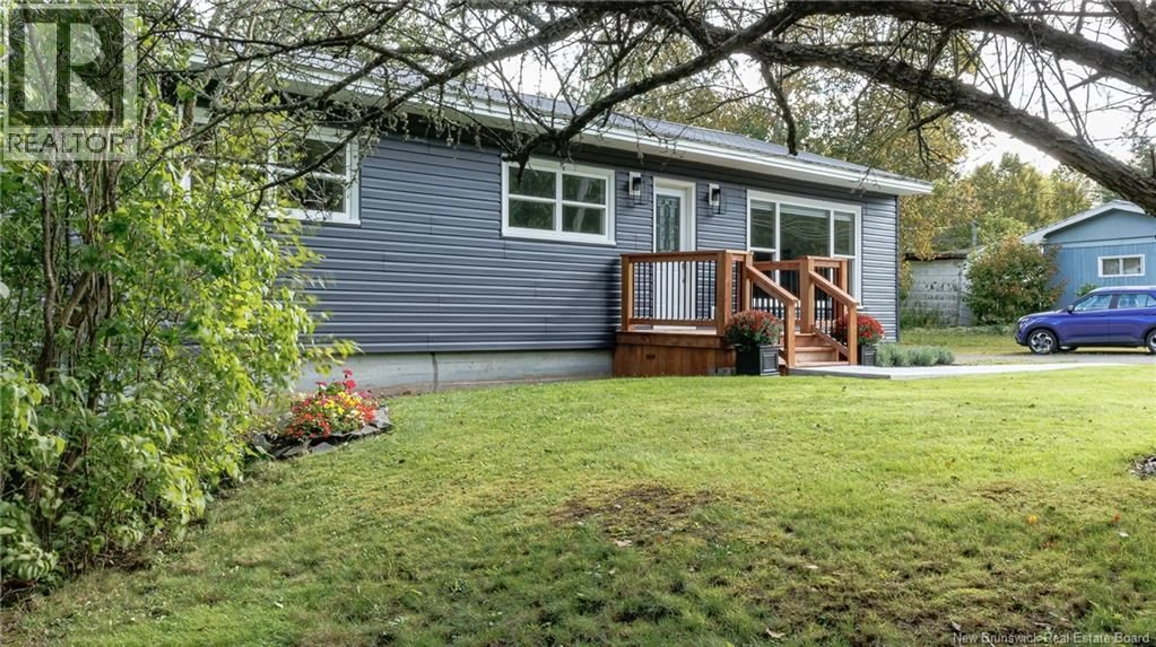 Home with vinyl exterior material, street for 398 EAGLE ROCK ROAD, Welsford New Brunswick E5K3Y2