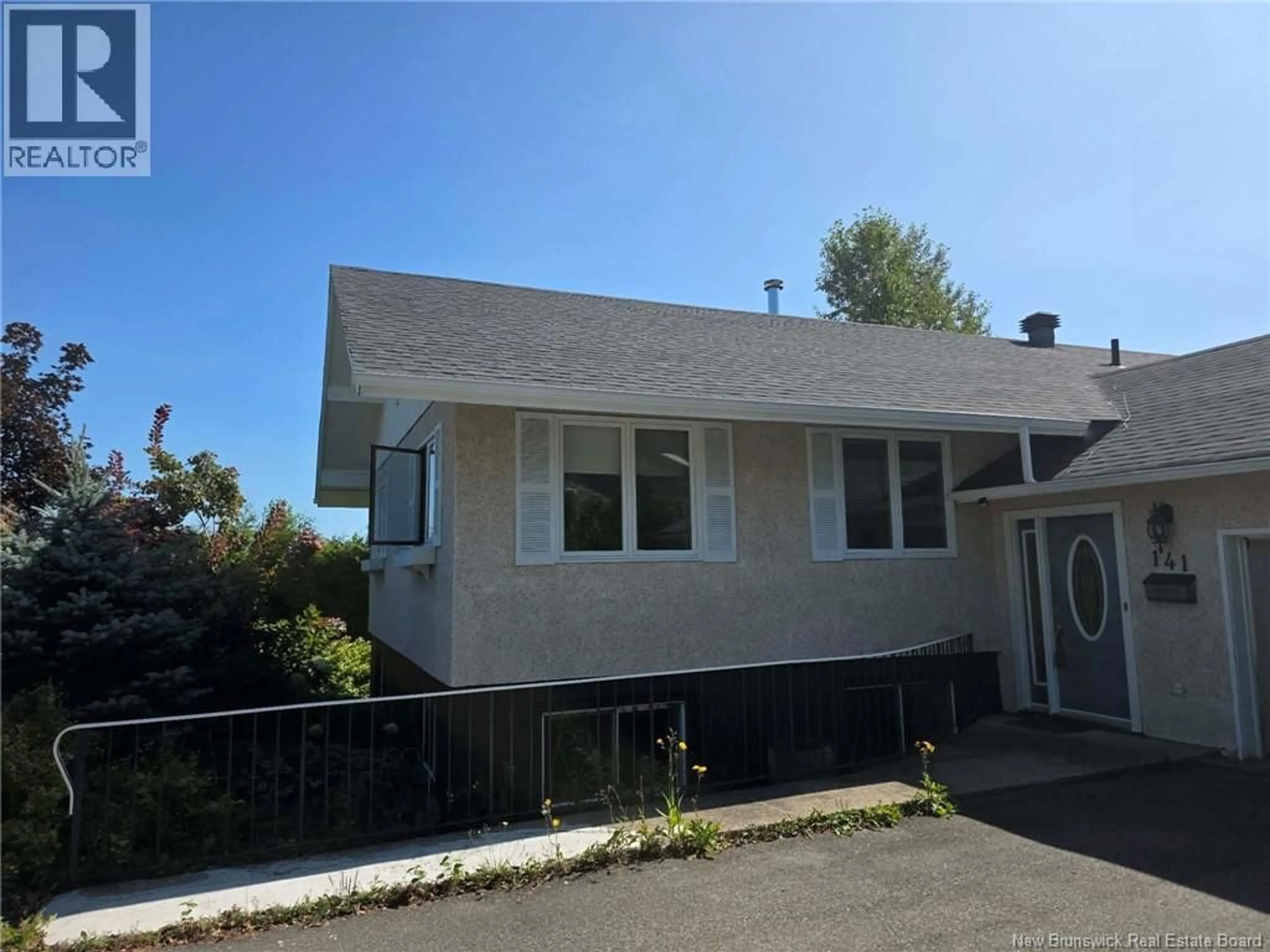 Home with vinyl exterior material, street for 141 NEIL, Bathurst New Brunswick E2A3E3