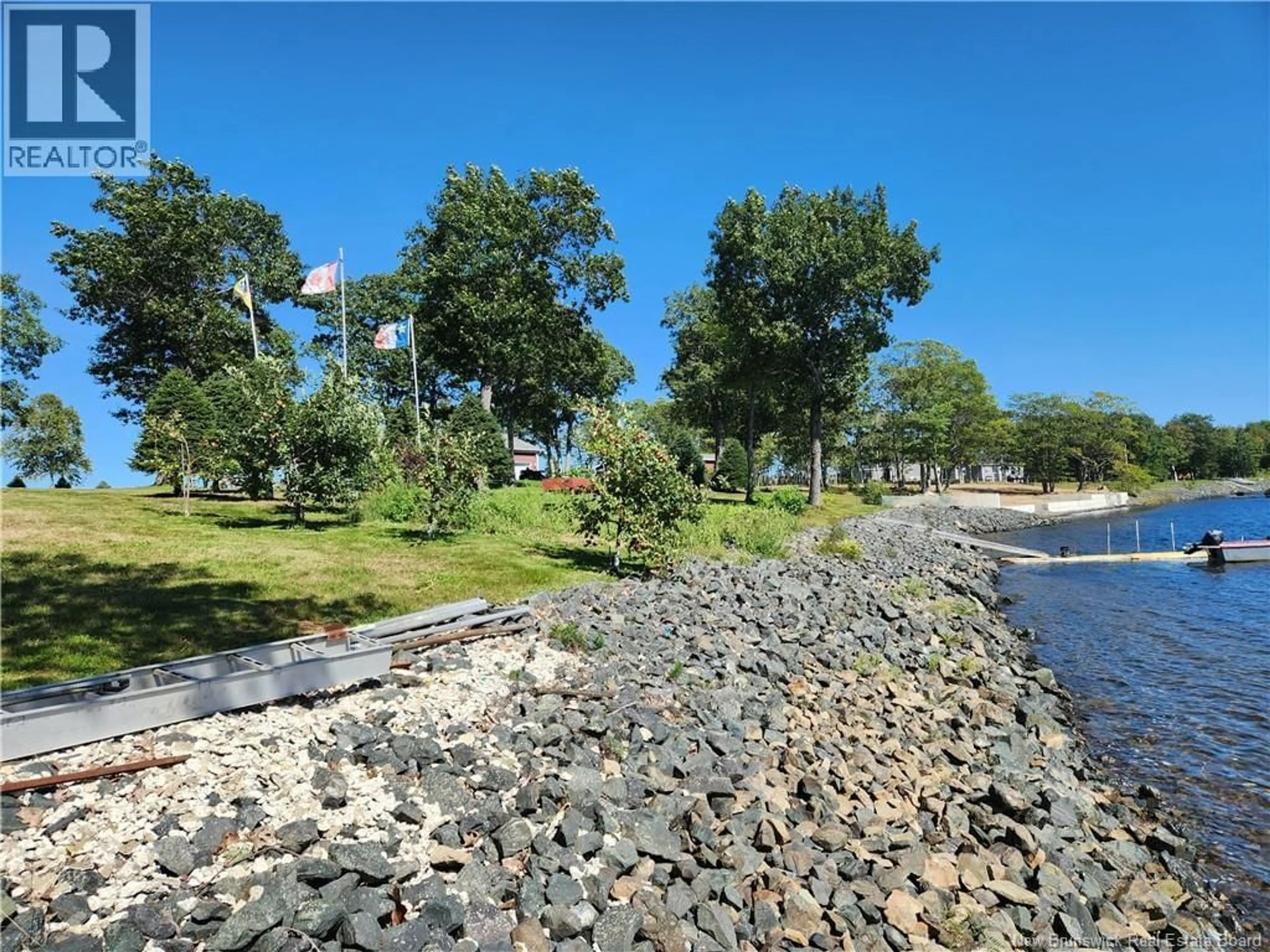 A pic from outside/outdoor area/front of a property/back of a property/a pic from drone, water/lake/river/ocean view for 146 RUE OMER, Pointe-À-Tom New Brunswick E1X3X1