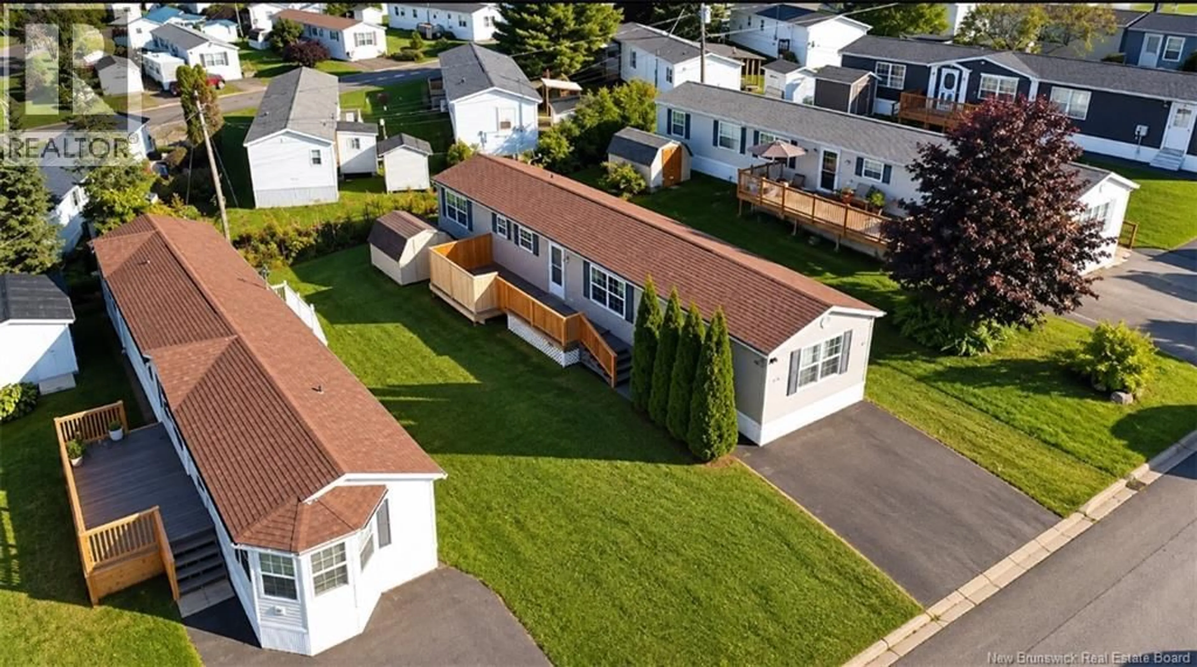 A pic from outside/outdoor area/front of a property/back of a property/a pic from drone, street for 52 SHERRYS LANE, Fredericton New Brunswick E3C1C8