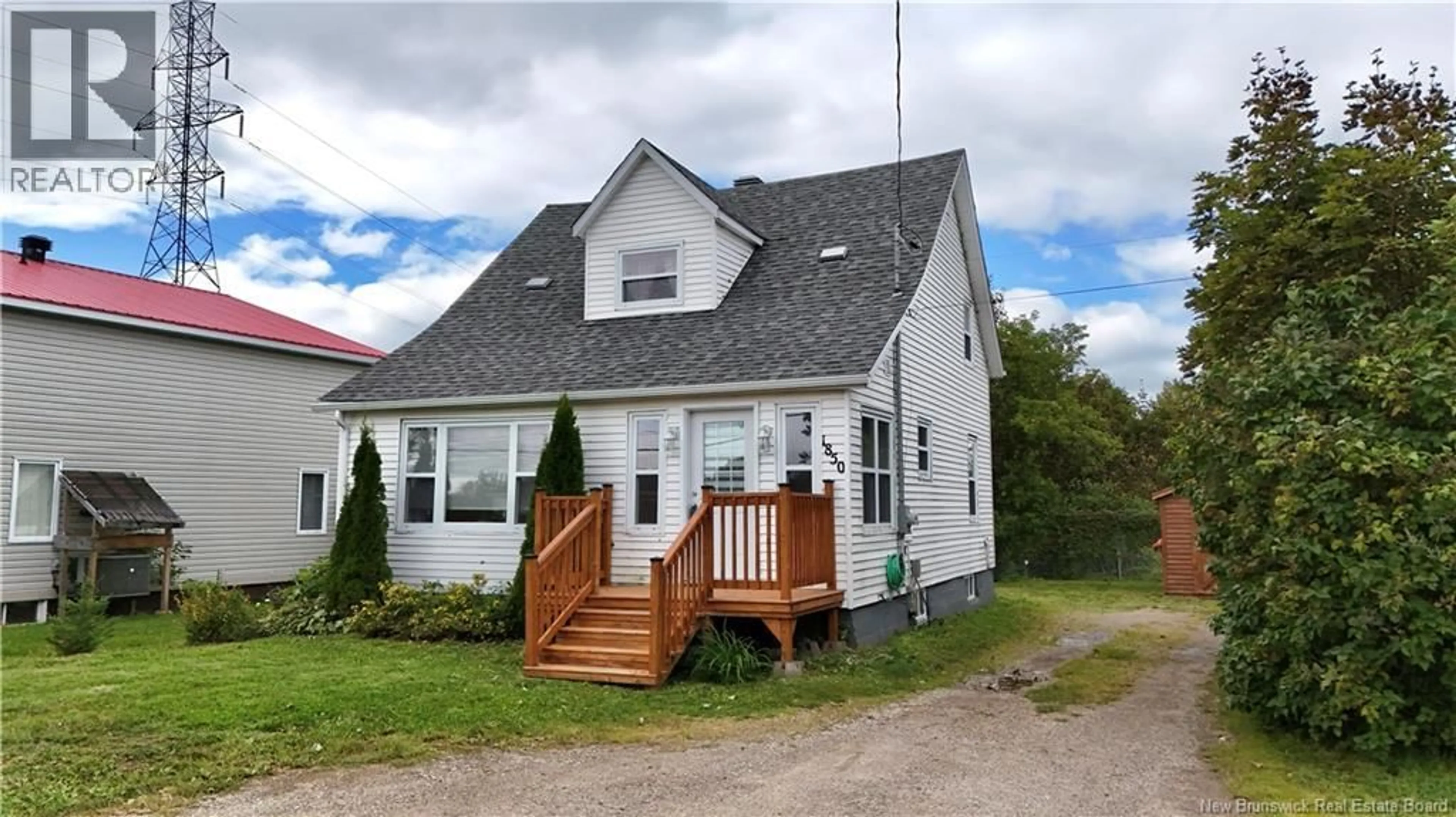 Home with vinyl exterior material, street for 1850 ROUGH WATERS, Bathurst New Brunswick E2A1X8